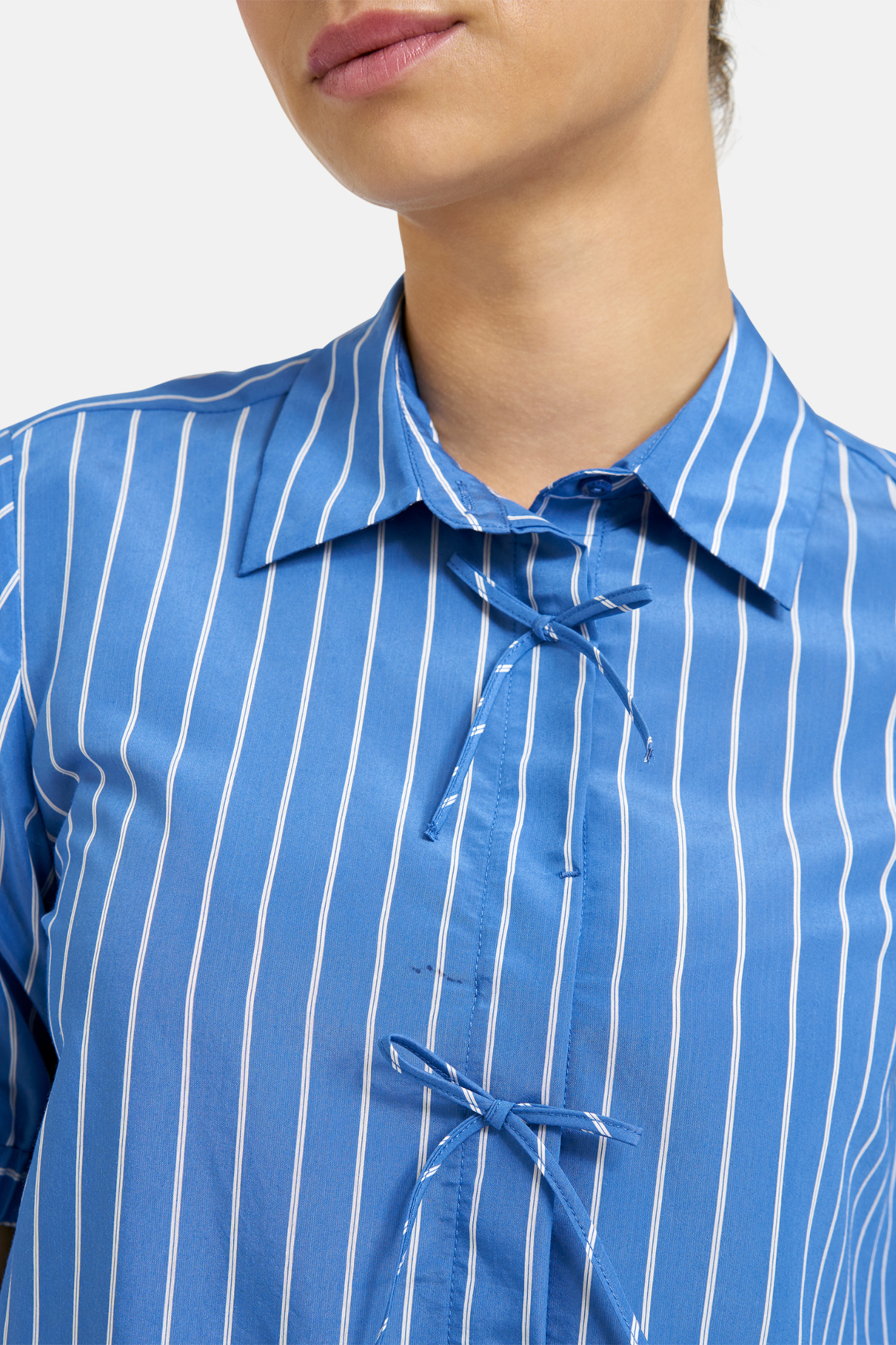 Close-up of collar and bow detail on Milano 61-4839-6089 Shirt Blouse with Bow Placket – Blue Print by MILANO, shop MILANO at Dotique