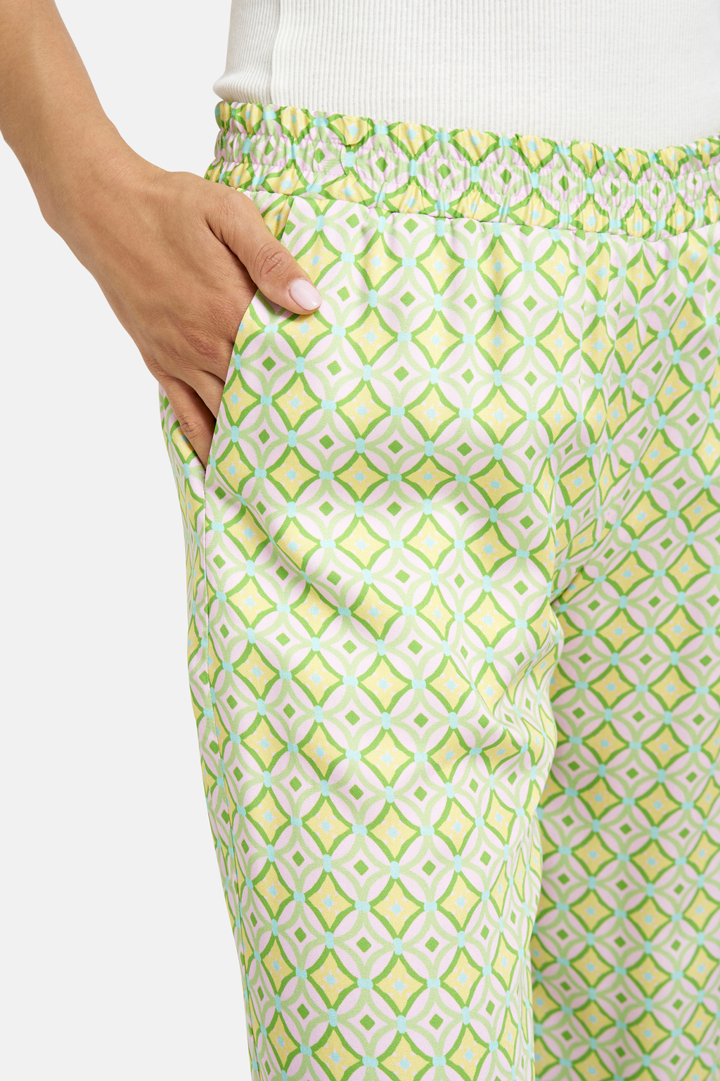 Close-up of hand in pocket on Milano 61-6513-2279 Wide-Leg Trousers with Elastic Waist – Kiwi Print by MILANO, shop MILANO at Dotique