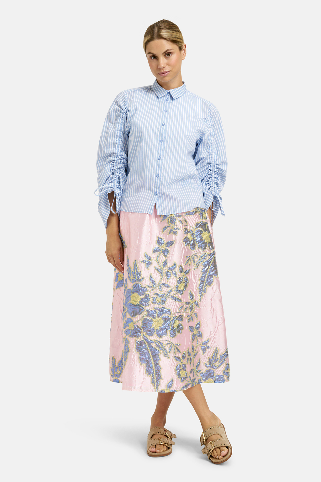 This Milano midi skirt is an easy, feminine style designed to move with you. Shop Milano at Dotique.