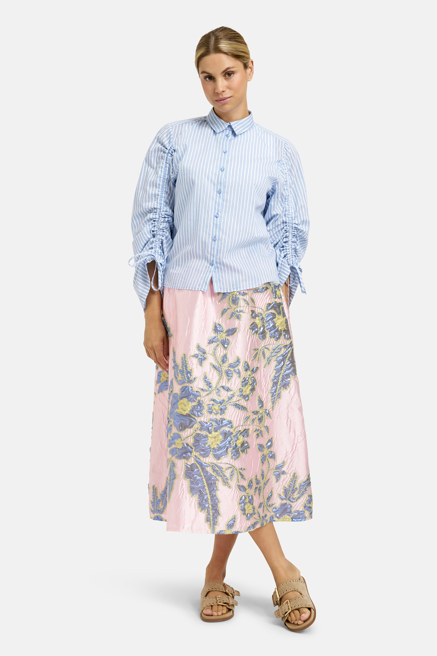 This Milano midi skirt is an easy, feminine style designed to move with you. Shop Milano at Dotique.