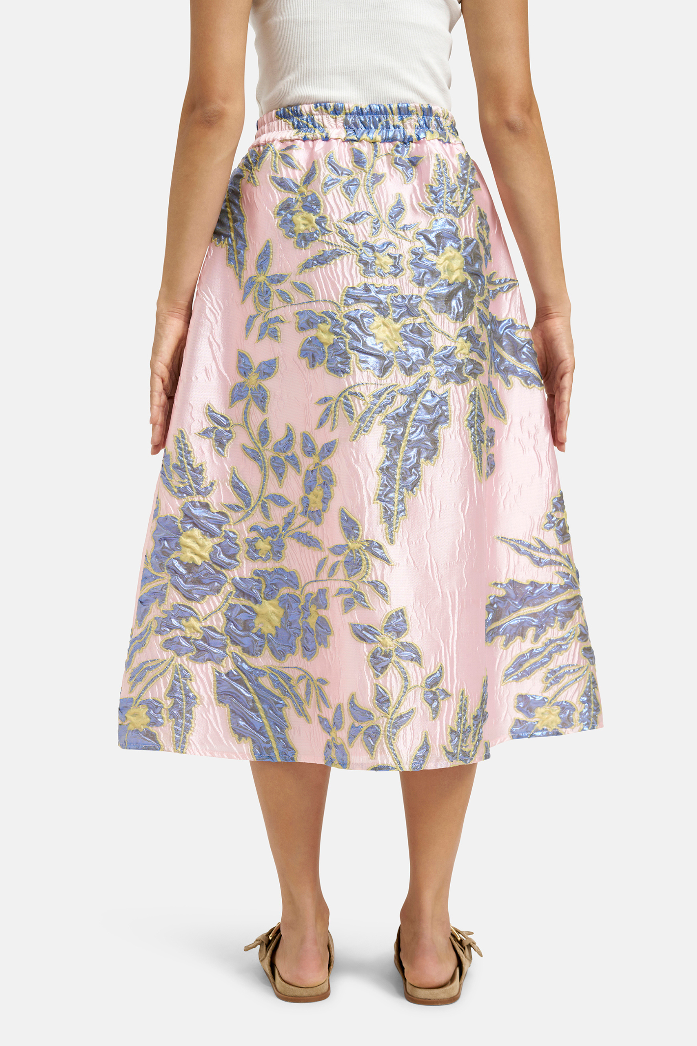 This Milano midi skirt is an easy, feminine style designed to move with you. Shop Milano at Dotique.