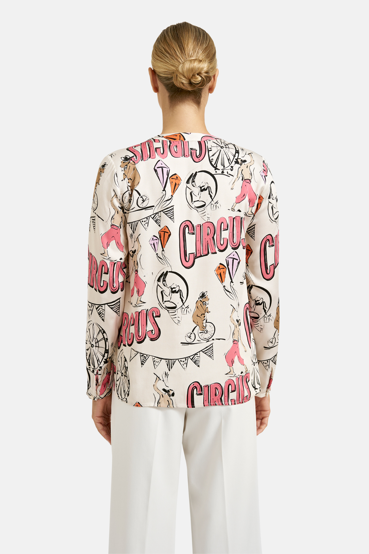 Back view of a model wearing Milano Italy 61-6506-3061 Cream Print V-Neck Blouse by MILANO, shop MILANO at Dotique.