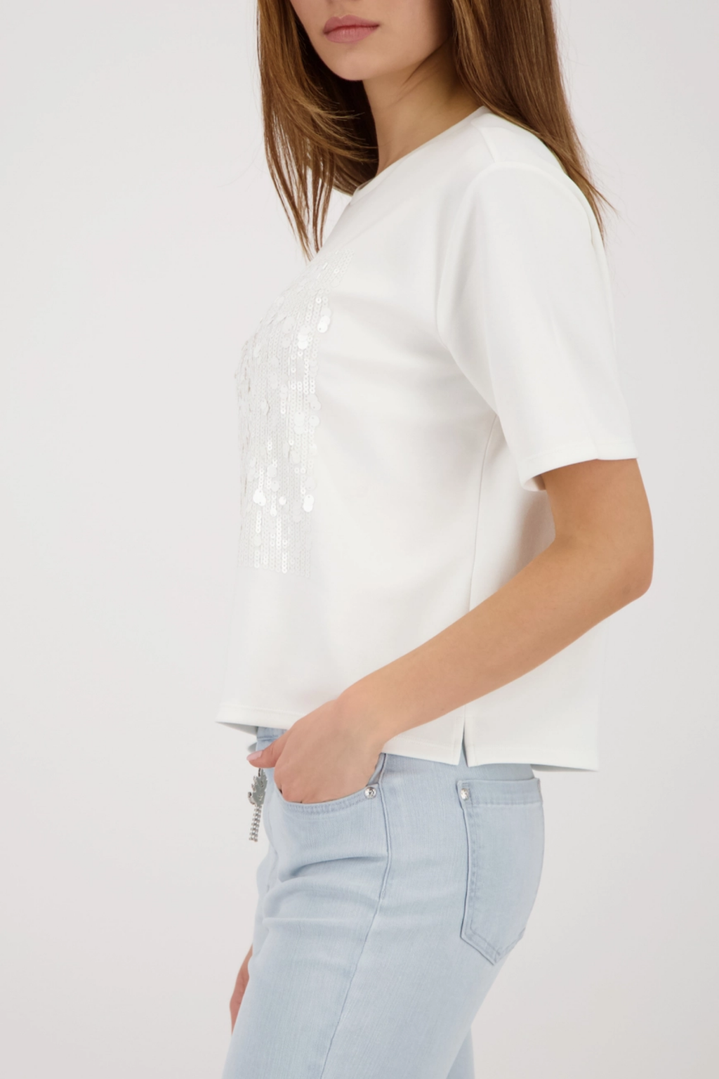 Monari 410124 Sequin Detail T-Shirt in Off-White shown side view with casual light jeans Shop Monari at Dotique