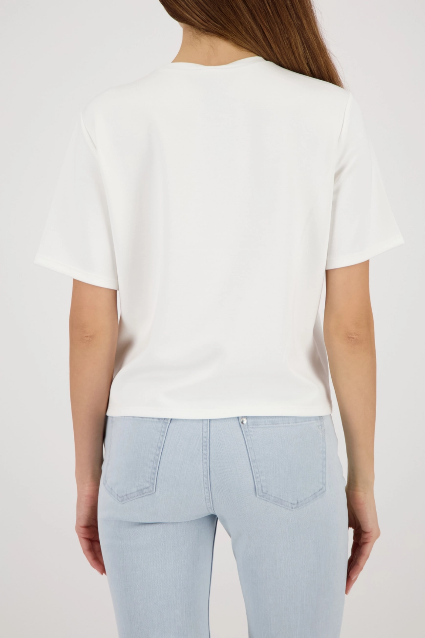 Back view of Monari 410124 Sequin Detail T-Shirt in Off-White styled with light jeans Shop Monari at Dotique
