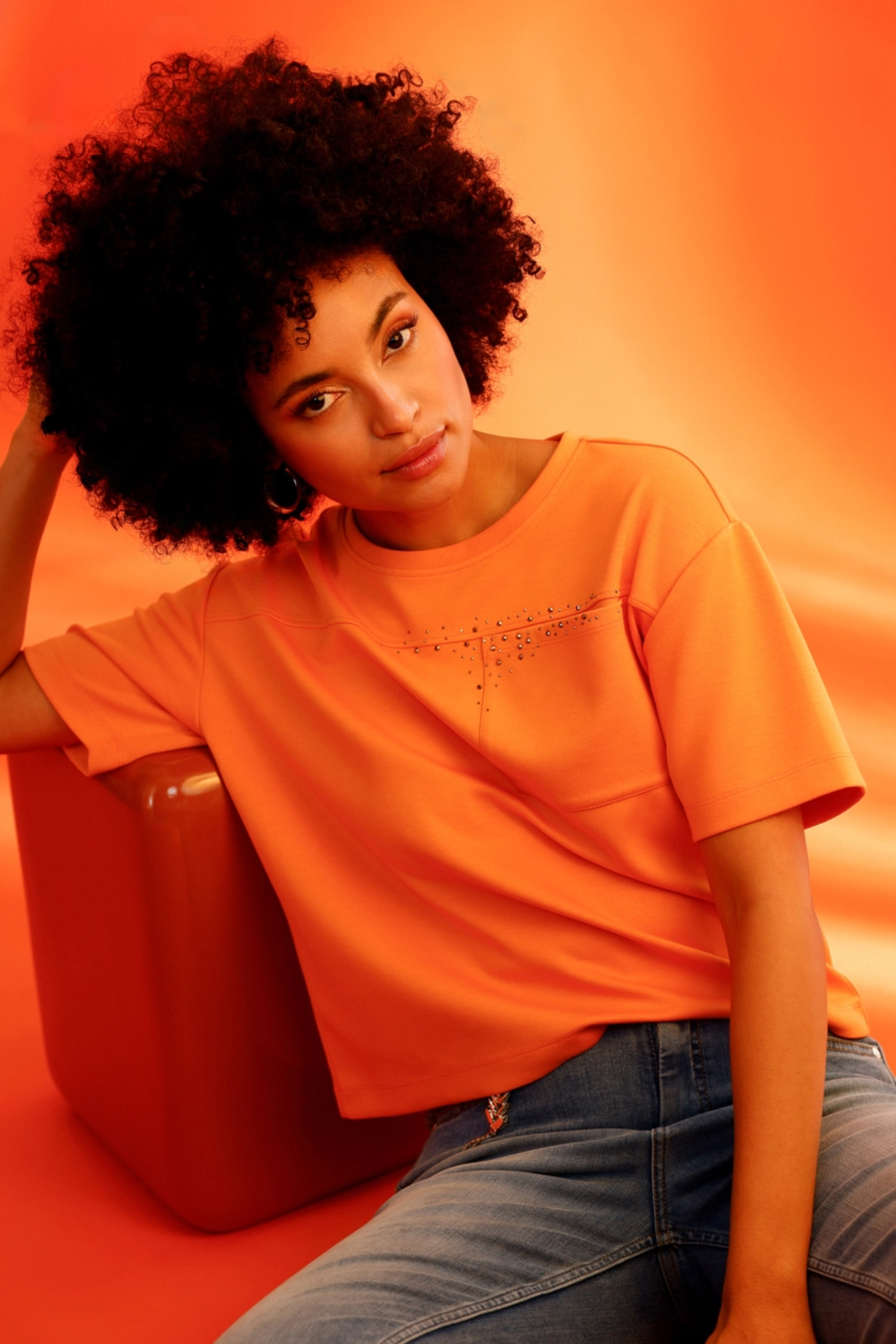 Monari 410127 Sweatshirt with Rhinestones Orange worn by model, stylish casual look, shop Monari at Dotique.