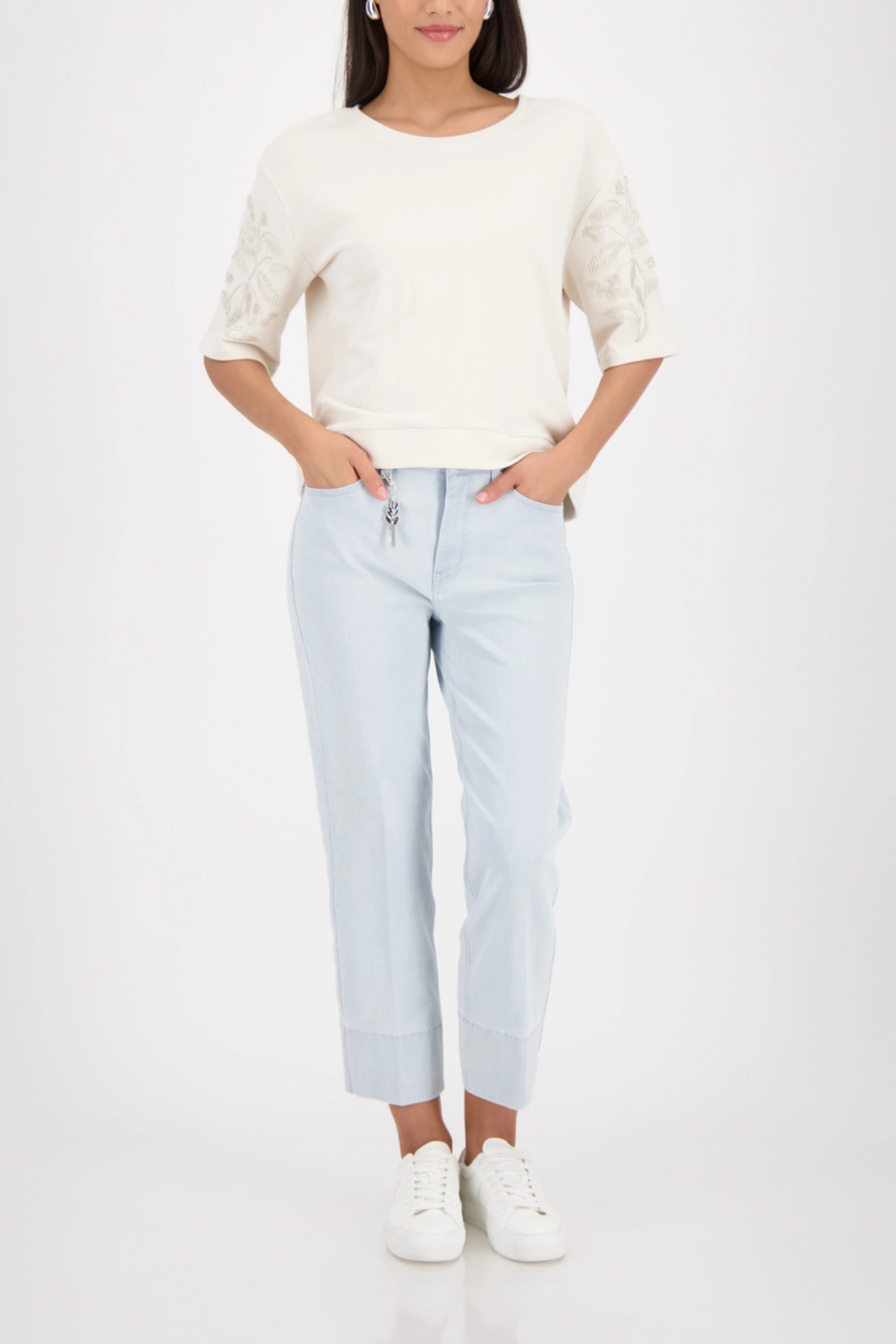 Monari 410257 Off-White Pearl Detail Cotton Sweatshirt styled with light denim jeans worn by model shop Monari at Dotique