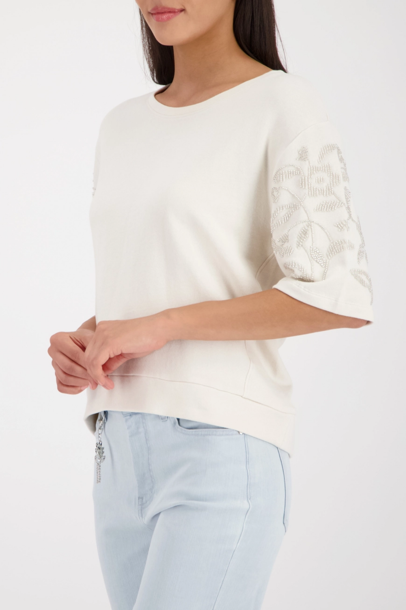 Monari 410257 Off-White Pearl Detail Cotton Sweatshirt with embellished sleeves worn by model Shop Monari at Dotique