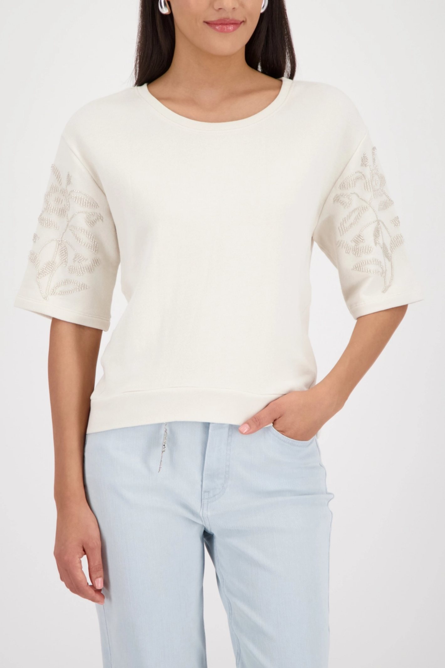 Monari 410257 Off-White Pearl Detail Cotton Sweatshirt worn by model with light blue jeans, shop Monari at Dotique