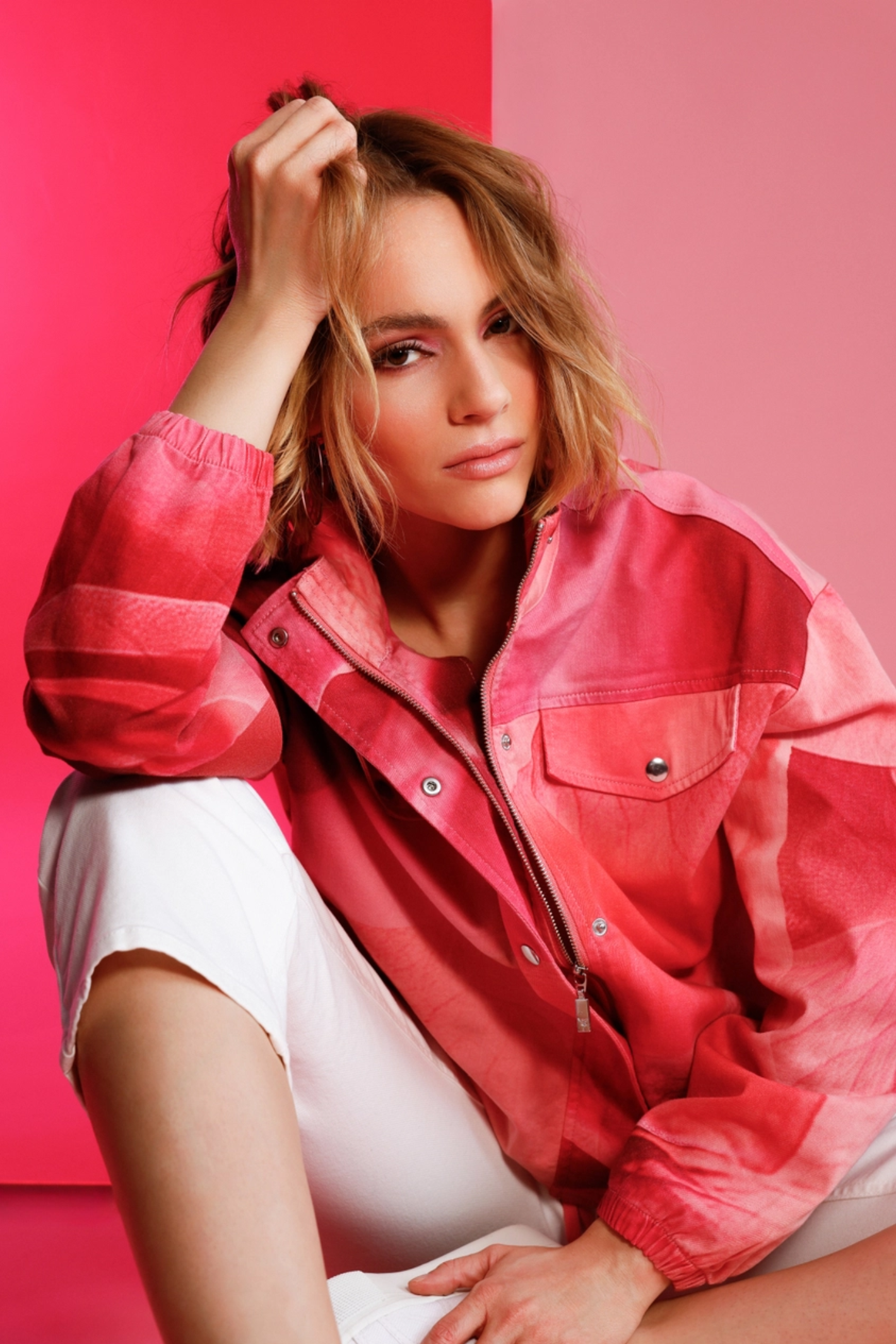 Woman wearing Monari 410331 All Over Pattern Jacket Spring Flower in pink tones by Monari shop at Dotique