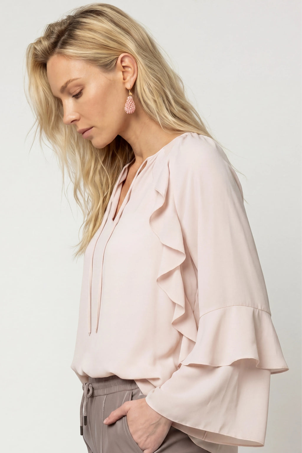 Side view of model wearing Monari 809721 Blouse Rosewater by Monari, shop the vendor at Dotique for elegant styles
