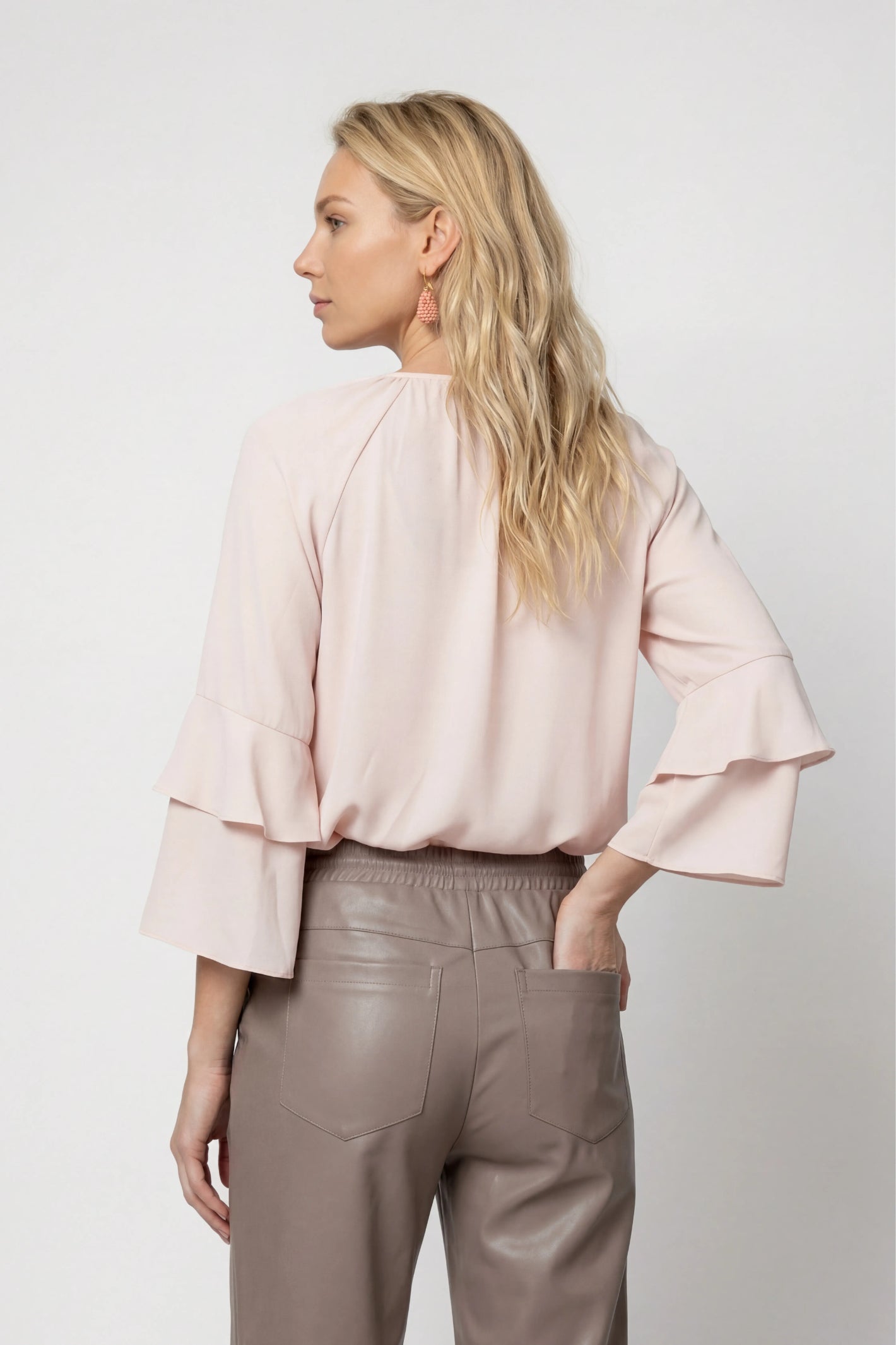 Back view of Monari 809721 Blouse Rosewater with tiered sleeves, shop Monari at Dotique for feminine styles