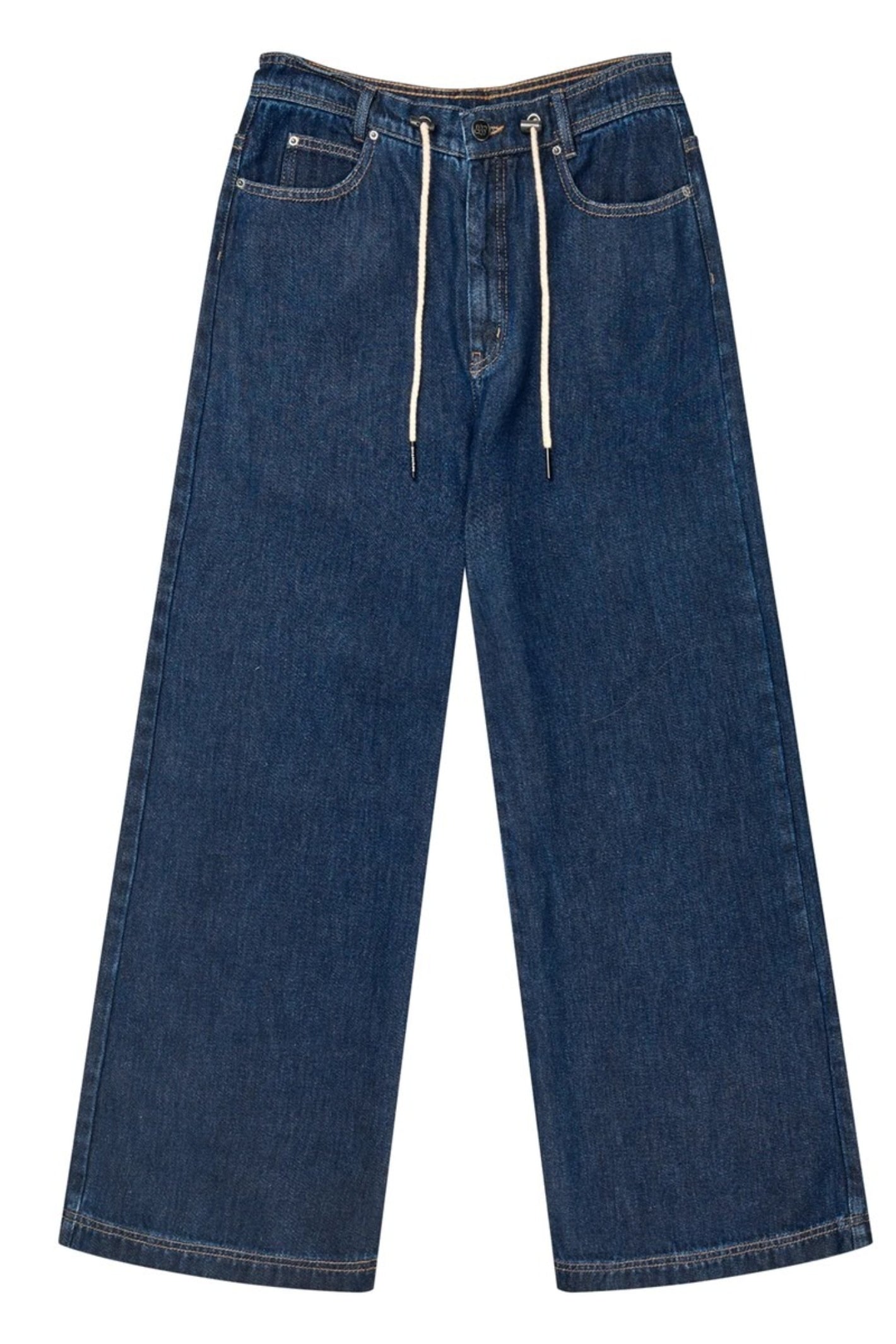 Model wearing the MUNTHE Obey Wide Leg Trousers in Indigo with a relaxed fit, tie waist and flowing wide-leg silhouette. Shop Munthe at Dotique.