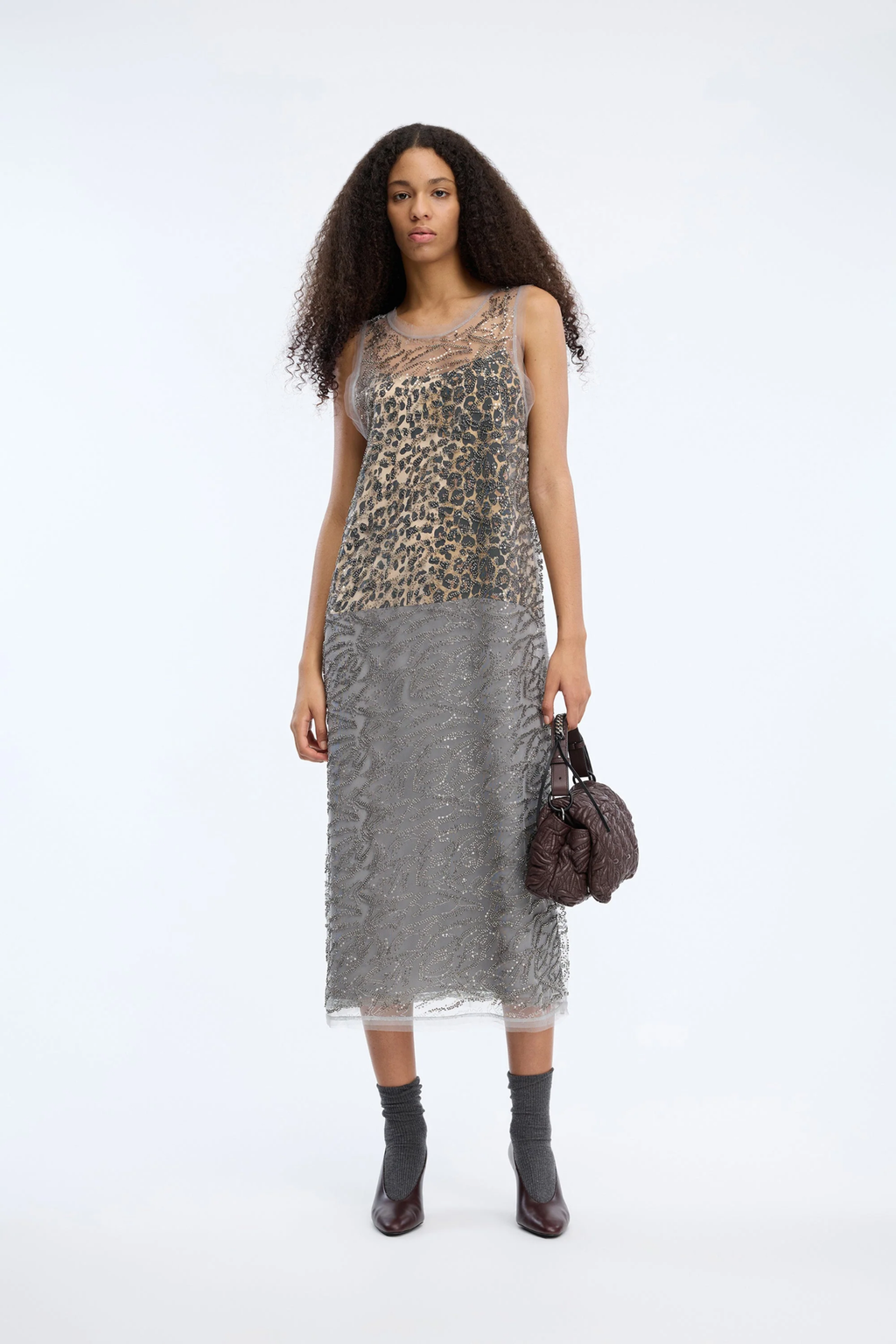 Shop the MUNTHE Varika Dress in Gun Metal at Dotique. A beautifully draped occasion dress in a contemporary metallic shade, perfect for weddings, parties and evening events.