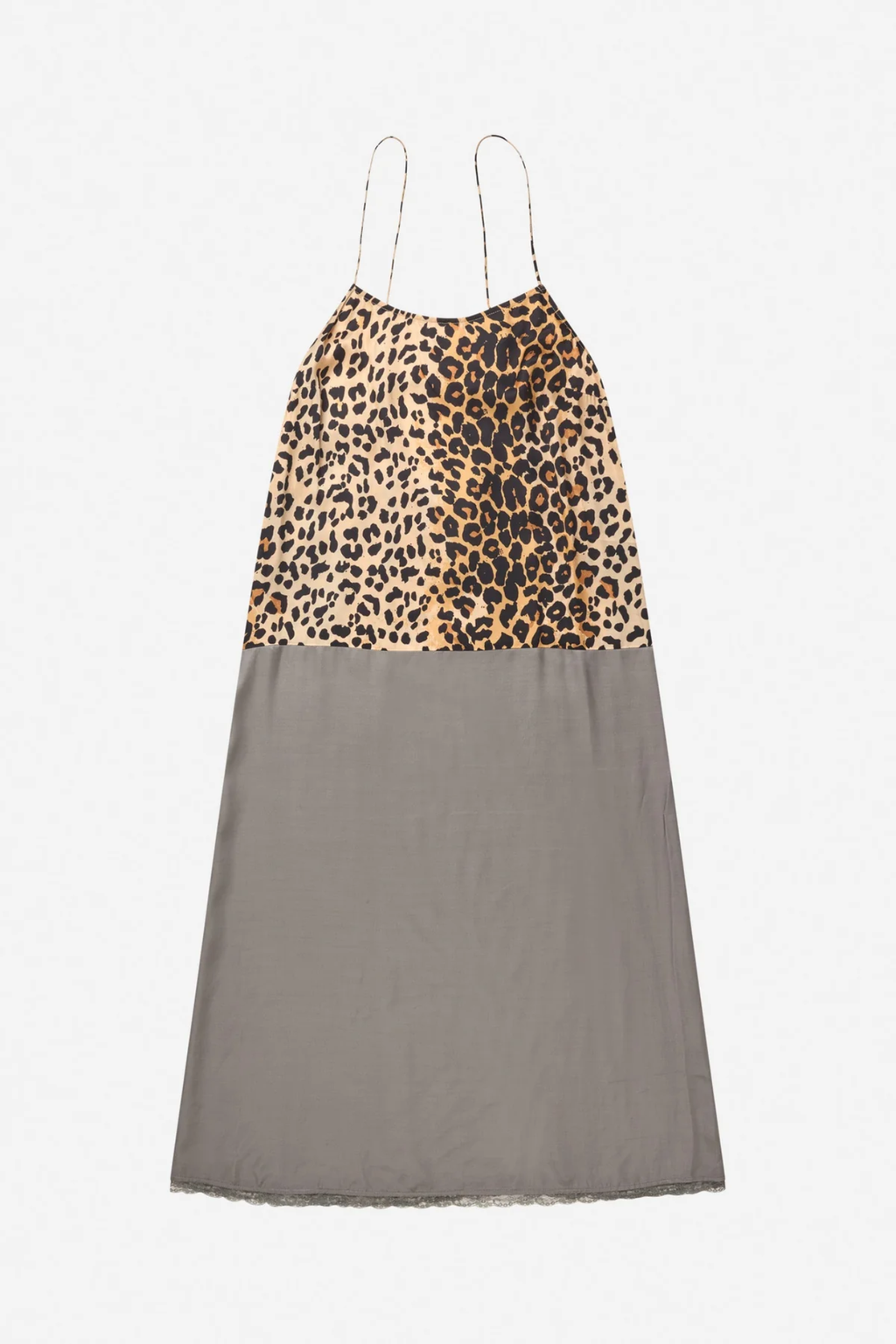 Shop the MUNTHE Varika Slip Dress in Print Animal at Dotique. A lightweight midi slip dress with delicate straps, a flattering silhouette and MUNTHE's exclusive animal-inspired print.