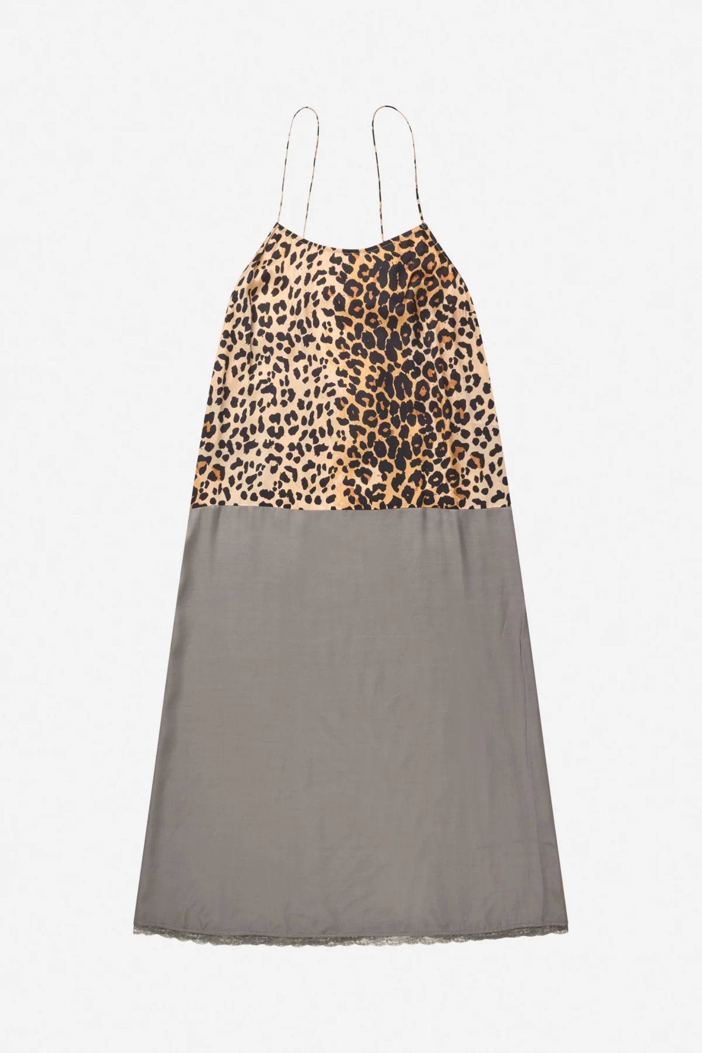 Shop the MUNTHE Varika Slip Dress in Print Animal at Dotique. A lightweight midi slip dress with delicate straps, a flattering silhouette and MUNTHE's exclusive animal-inspired print.