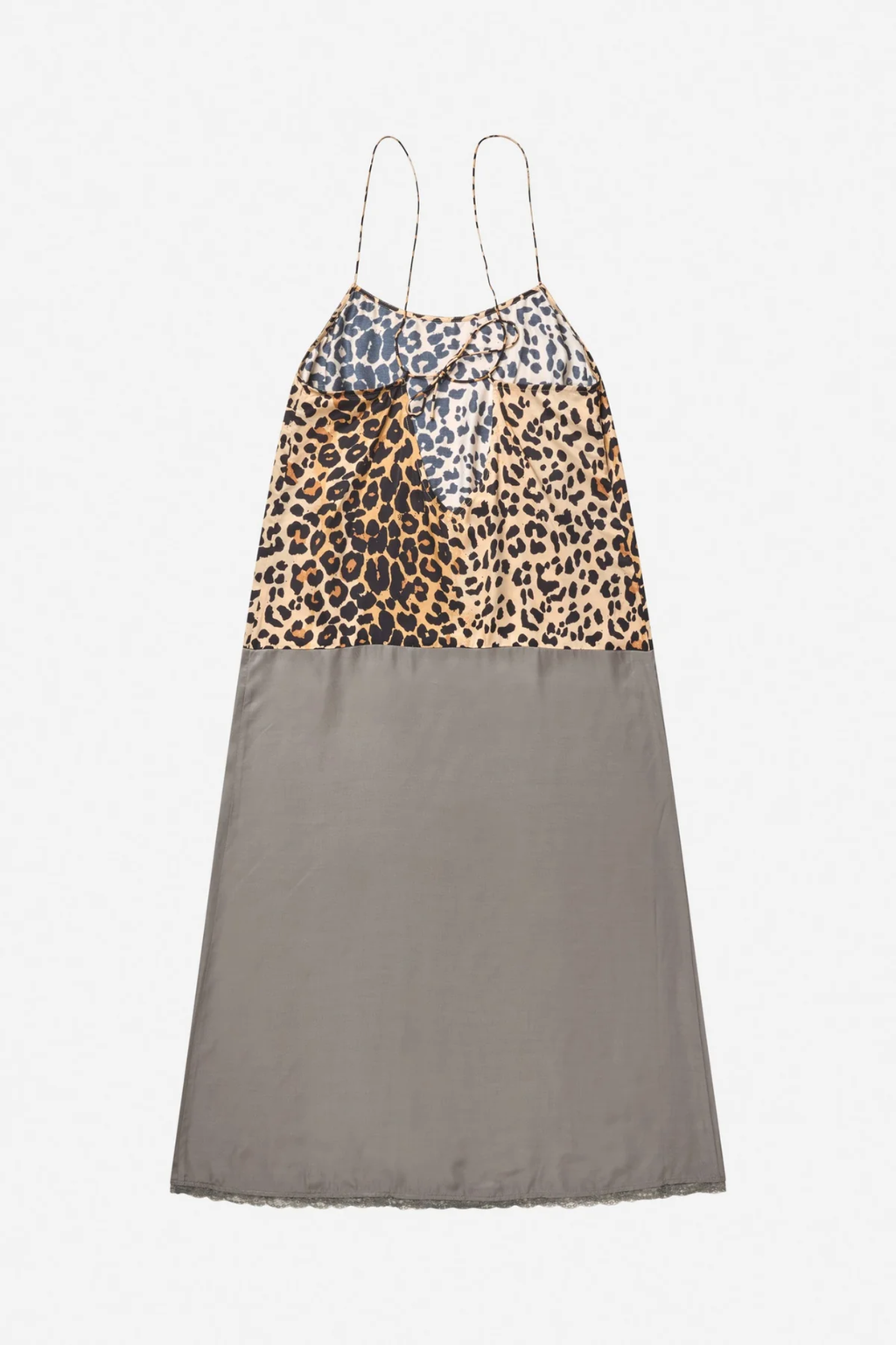 Shop the MUNTHE Varika Slip Dress in Print Animal at Dotique. A lightweight midi slip dress with delicate straps, a flattering silhouette and MUNTHE's exclusive animal-inspired print.