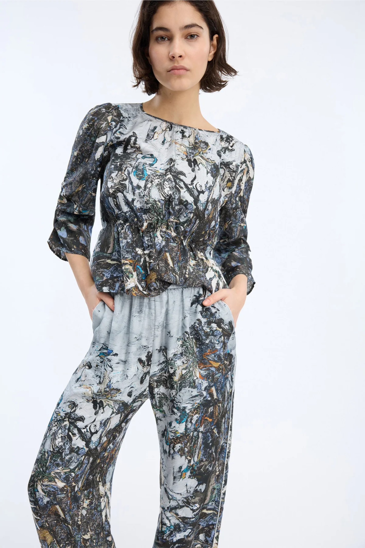 Shop the MUNTHE Virago Top in Print Grey at Dotique. Crafted from 100% silk with an exclusive print, this beautifully draped blouse is perfect for effortless day-to-evening dressing.
