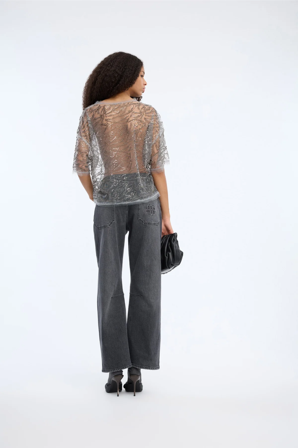 Shop the MUNTHE Vun Top in Gun Metal at Dotique. A beautifully draped metallic top with a relaxed fit, perfect for parties, evenings out and special occasions.