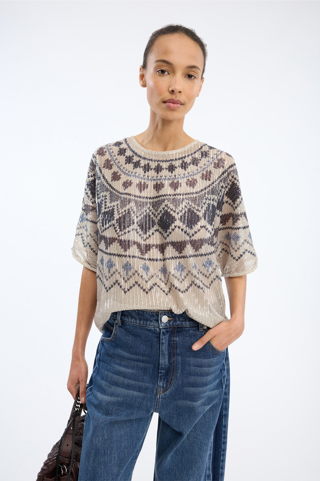 Shop the MUNTHE Vunny Top in Print Camel at Dotique. A beautifully draped printed top featuring MUNTHE's signature print, designed for effortless day-to-evening dressing.