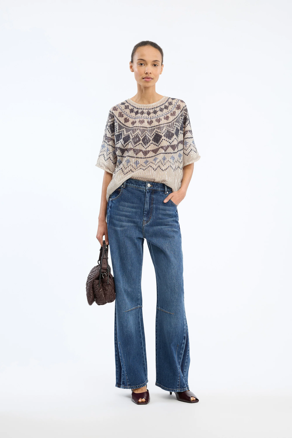 Shop the MUNTHE Vunny Top in Print Camel at Dotique. A beautifully draped printed top featuring MUNTHE's signature print, designed for effortless day-to-evening dressing.