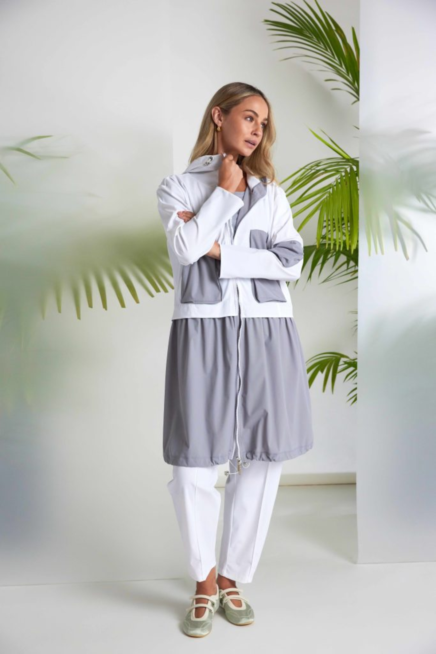 Soft white drawstring trousers by Naya in signature travel fabric. Comfortable, flattering and easy to wear. Shop Naya at Dotique.