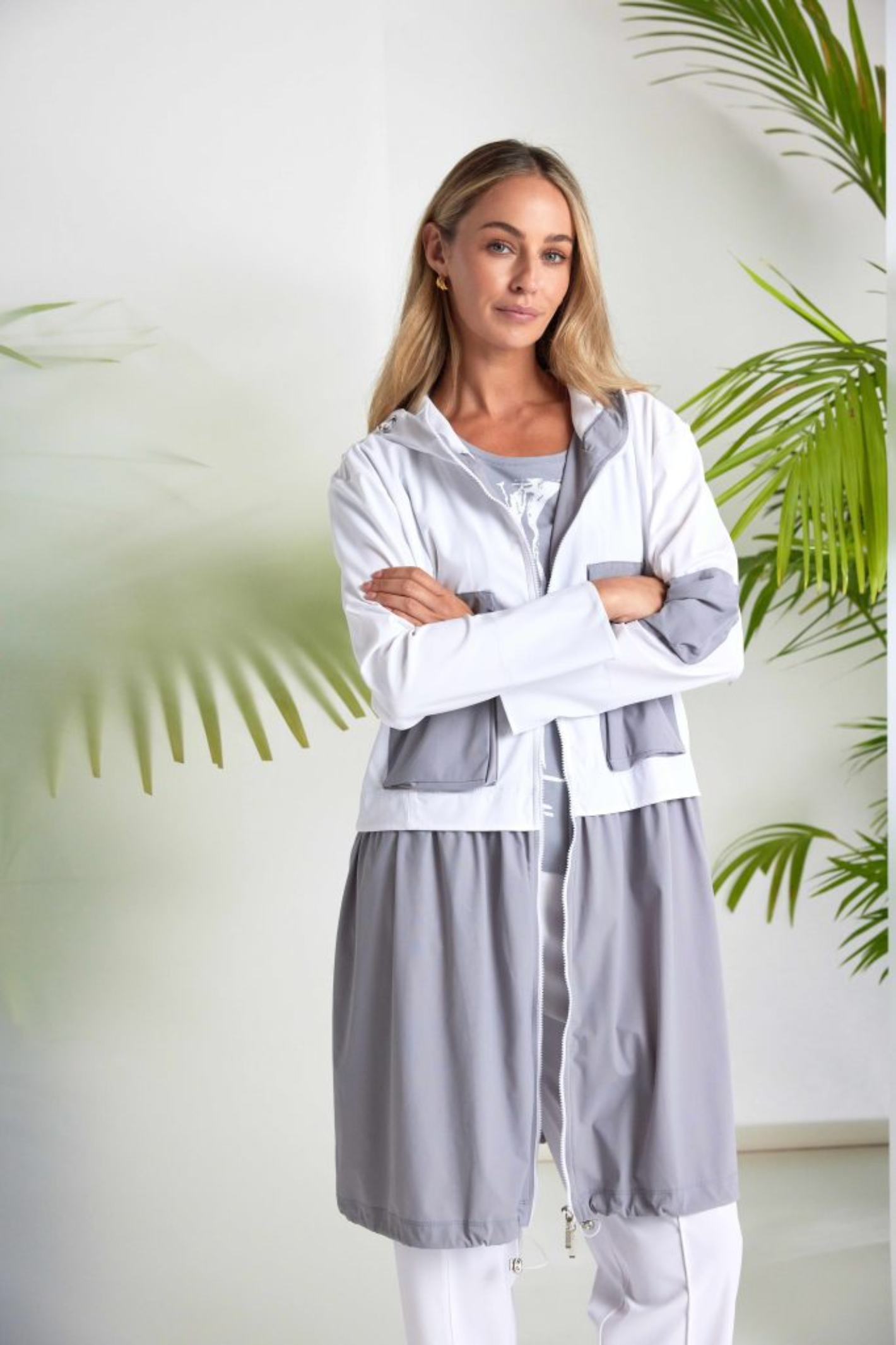 Soft white drawstring trousers by Naya in signature travel fabric. Comfortable, flattering and easy to wear. Shop Naya at Dotique.