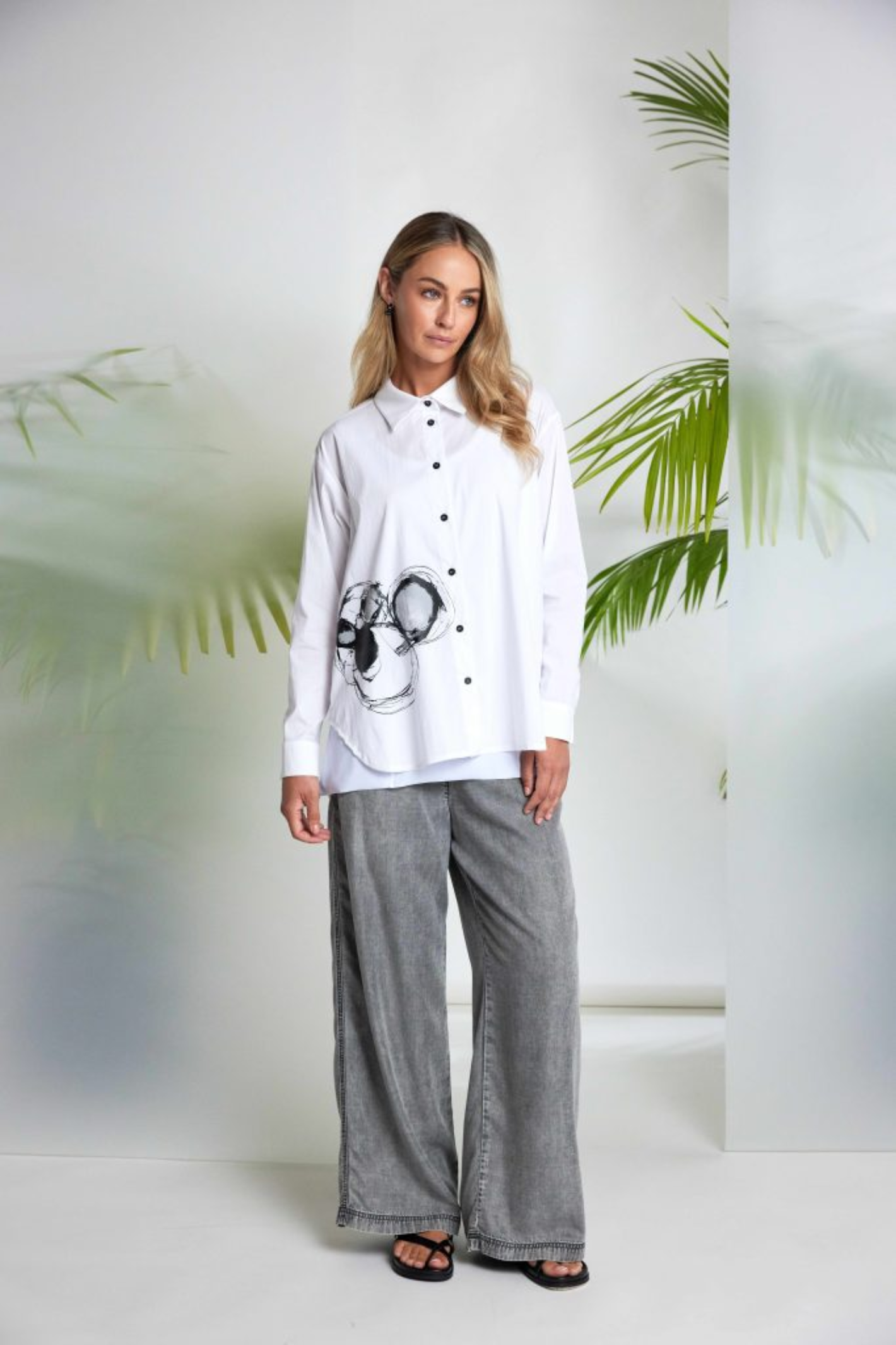 Model wearing Naya NAS26137 Granite Grey Wide Leg Pull-On Trousers by Naya, shop Naya at Dotique in relaxed pose