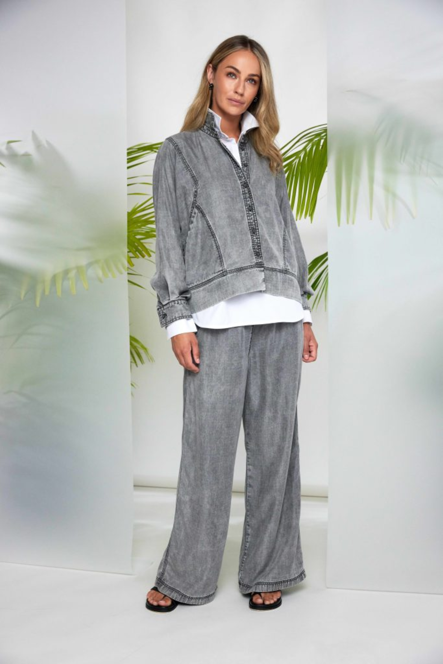 Model wearing Naya NAS26137 Granite Grey Wide Leg Pull-On Trousers by Naya, shop Naya at Dotique in casual outfit
