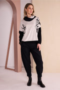 Naya NAW26140 Placement Print Top with Front Angle Seam Sand and Black. Shop Naya at Dotique.