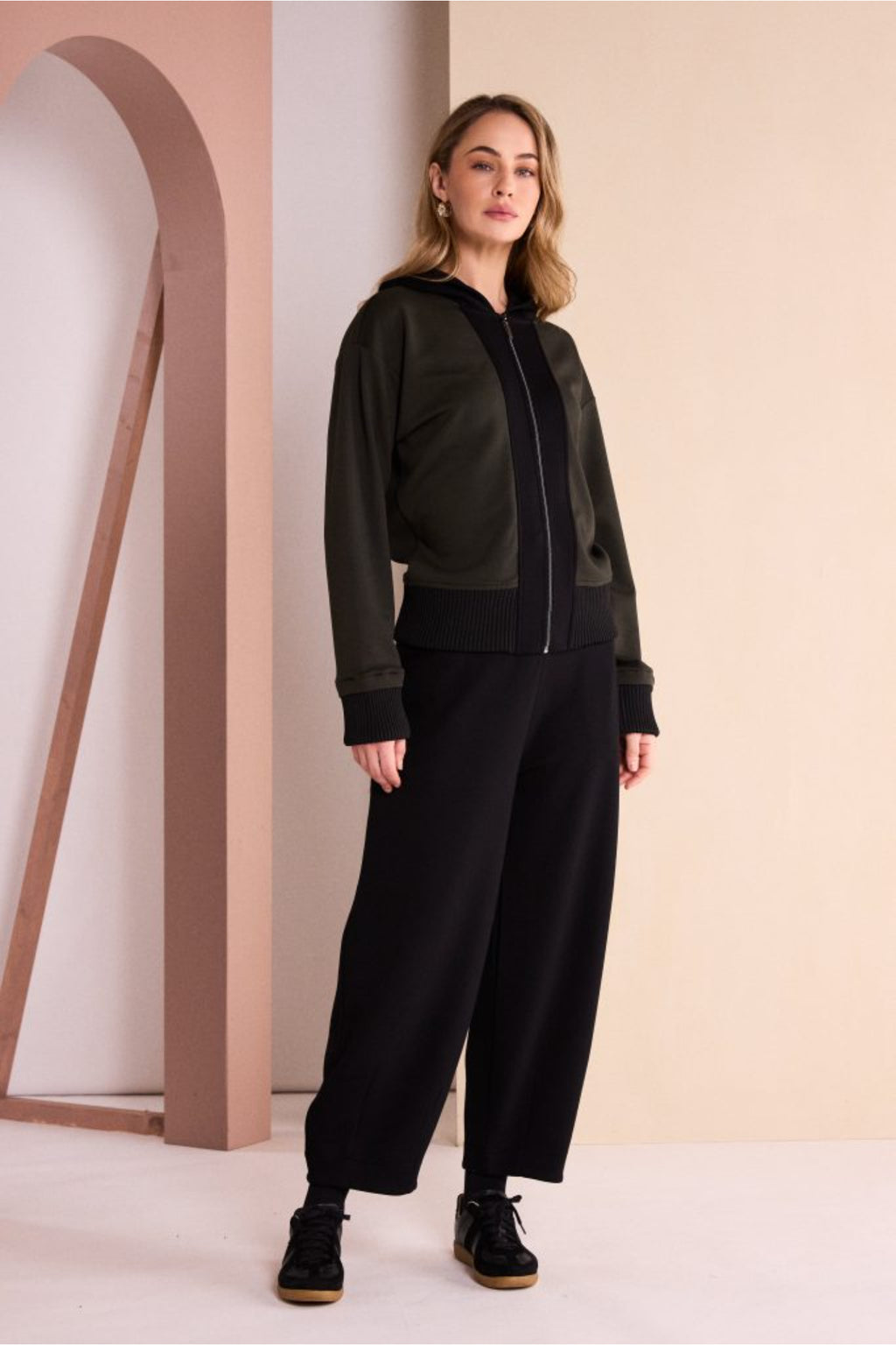Naya NAW26144 Balloon Shaped Trouser with Darts at Hem Black. Shop Naya at Dotique.