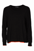 A relaxed NAYA jersey top in black with zesty tigerlily contrast trim at the cuffs and hem. Easy to pull on and easy to wear. Shop at Dotique.