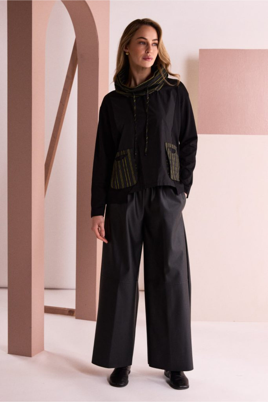 Naya NAW26153 Top with Stripe Drawstring Neck and Pocket Detail Black/Avocado. Shop Naya at Dotique.