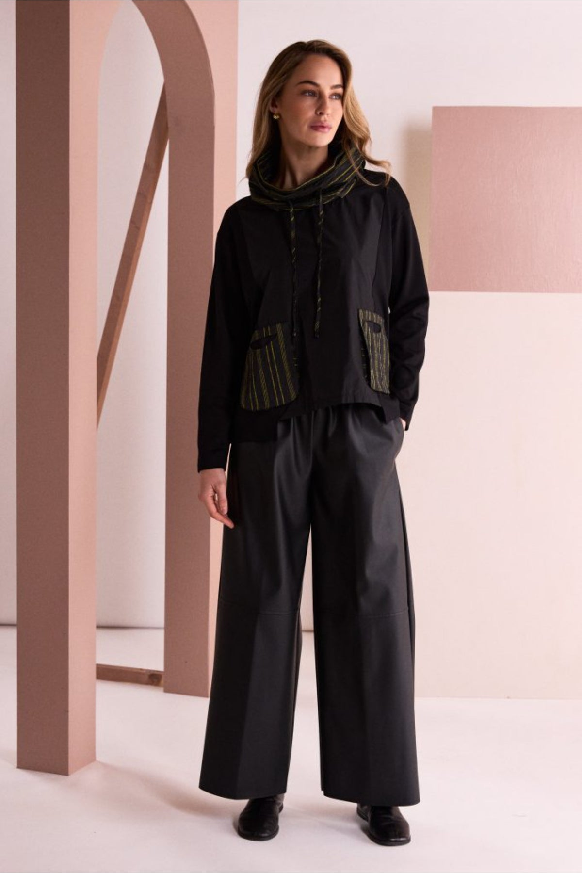 Naya NAW26153 Top with Stripe Drawstring Neck and Pocket Detail Black/Avocado. Shop Naya at Dotique.