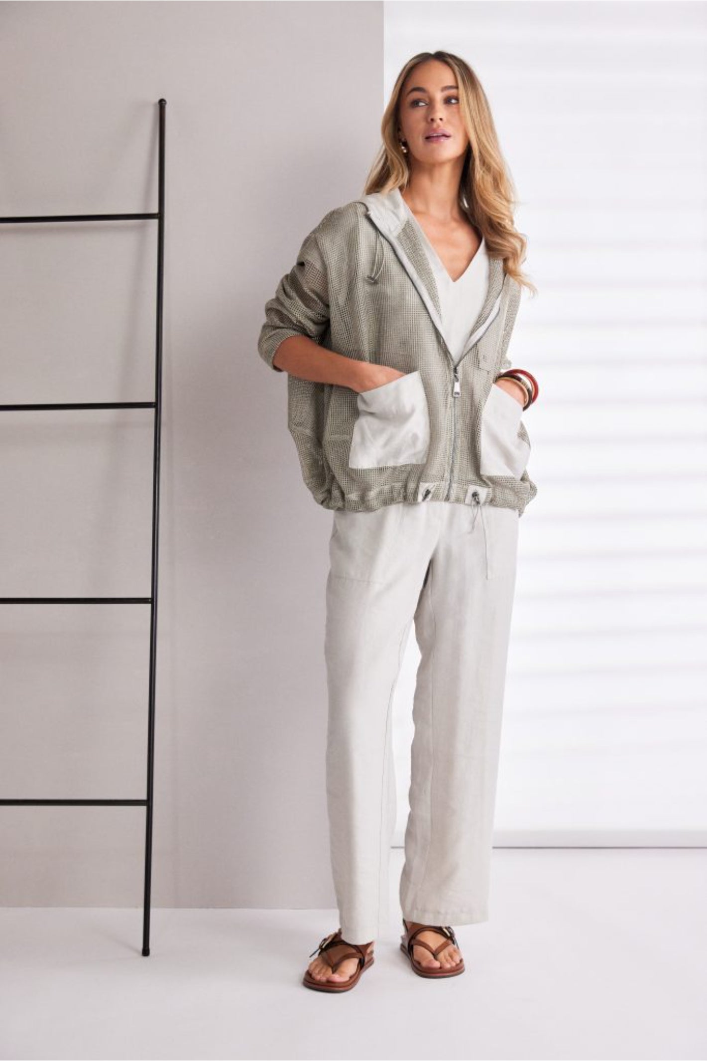 NAYA sand mesh hooded jacket featuring a zip front, contrast patch pockets, drawstring hem and relaxed fit design.