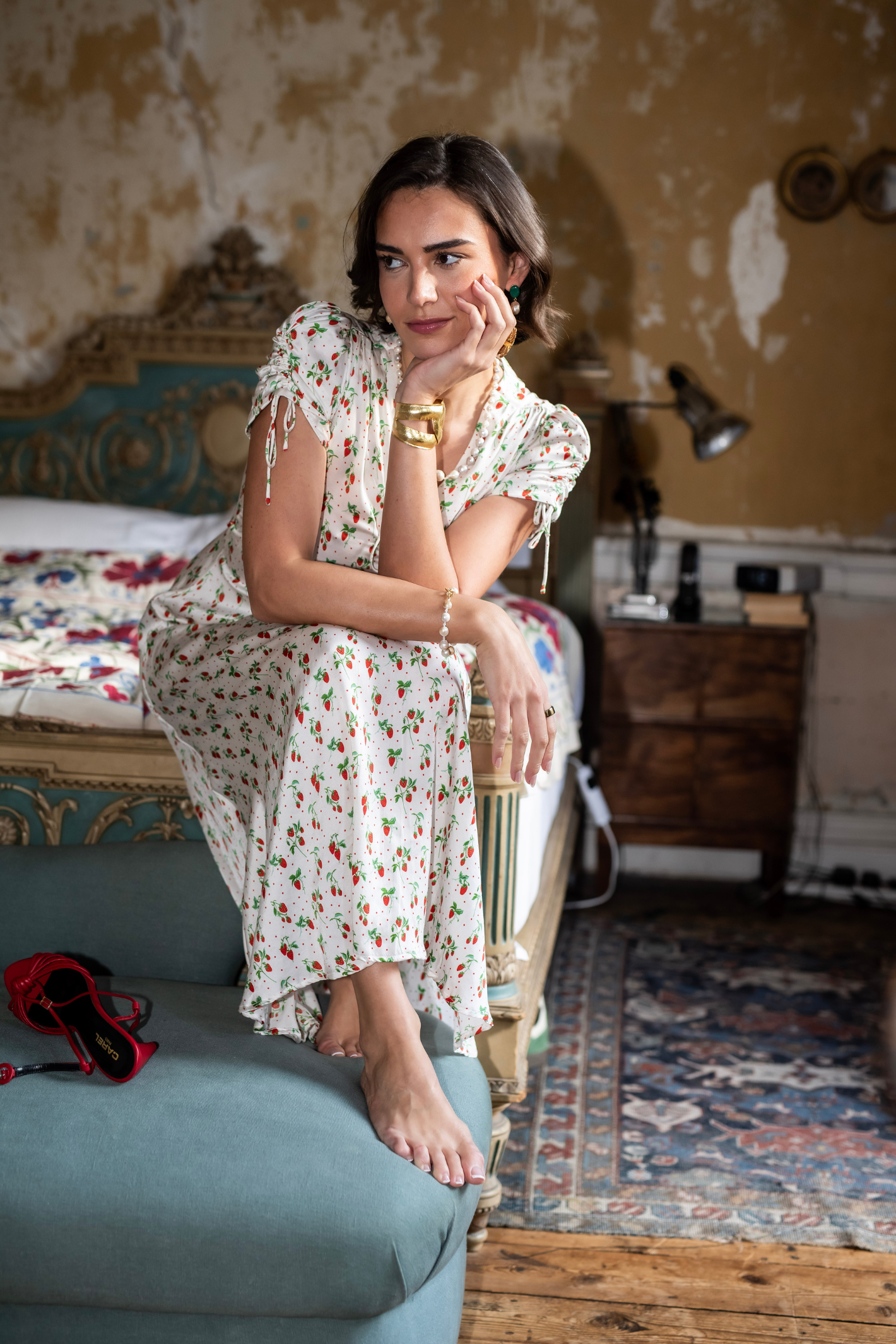 Model seated barefoot wearing New Day Originals Babbington Strawberries & Cream Dress by New Day Originals shop at Dotique