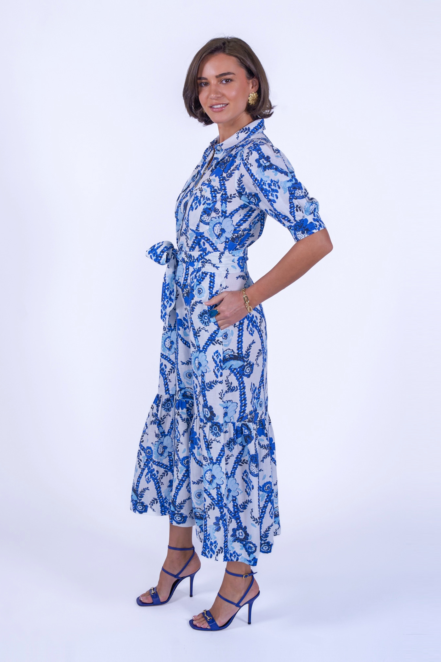 Model wearing New Day Originals Safari Blue Shirt Dress by New Day Originals, shop New Day Originals at Dotique.