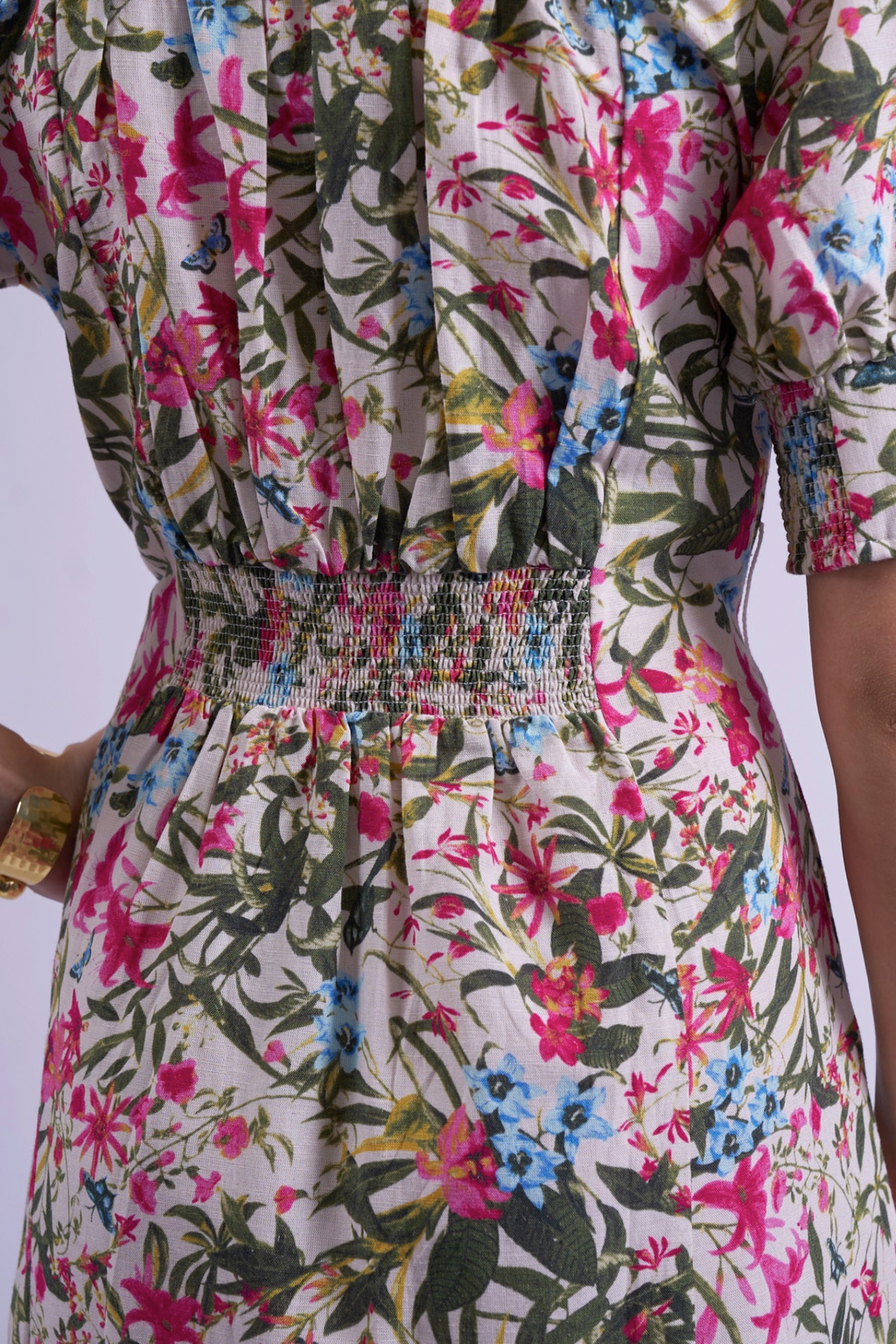 Close-up of smocked waist and floral fabric print on New Day Originals Sydney Dress Botanical by New Day Originals, shop the vendor at Dotique
