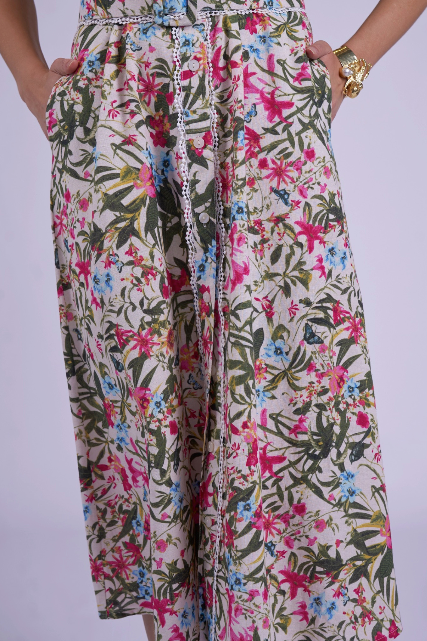 Close-up of floral fabric and button details on New Day Originals Sydney Dress Botanical by New Day Originals, shop New Day Originals at Dotique