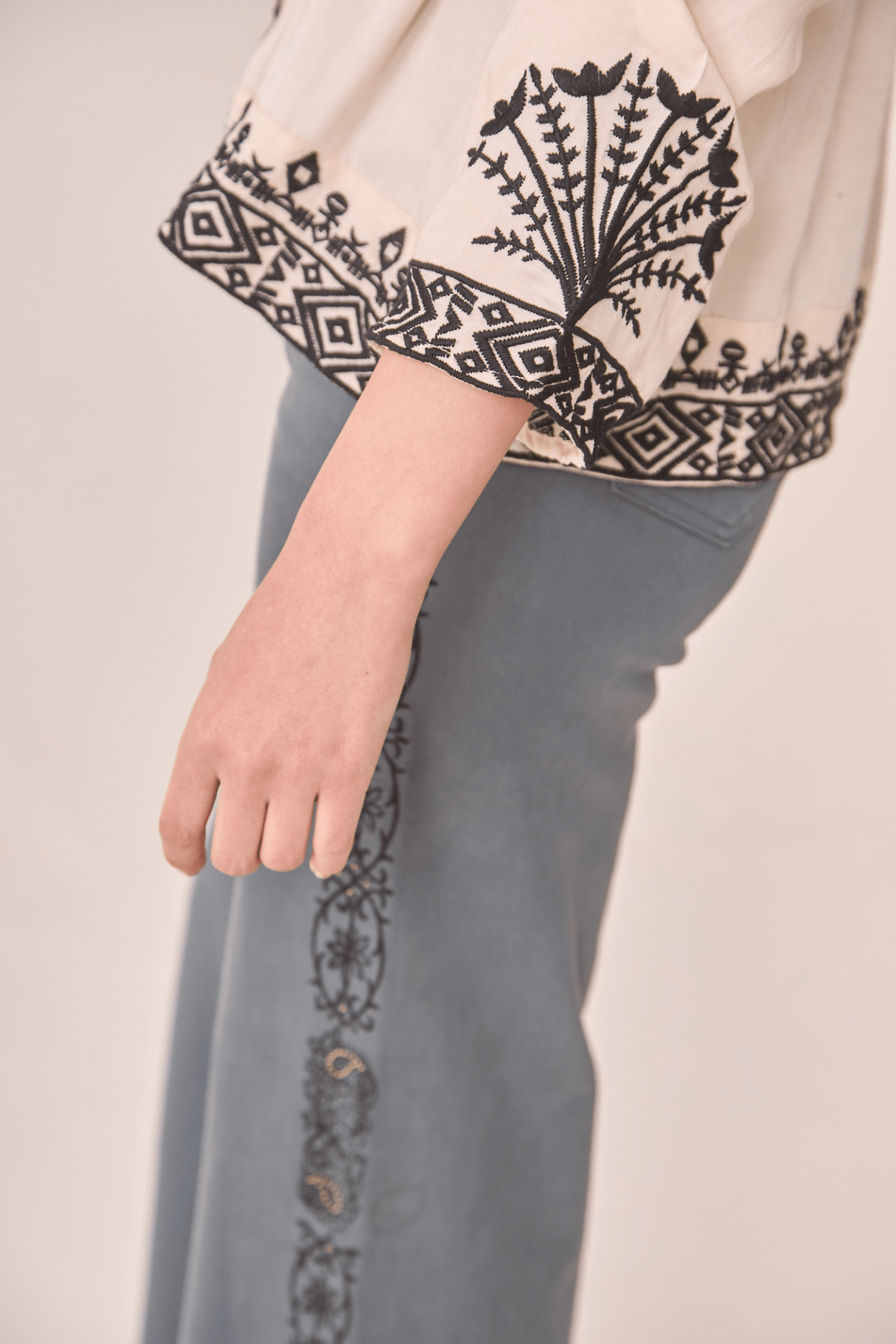 Dotique ecru NKN Nekane blouse with black embroidery and button front in soft modal