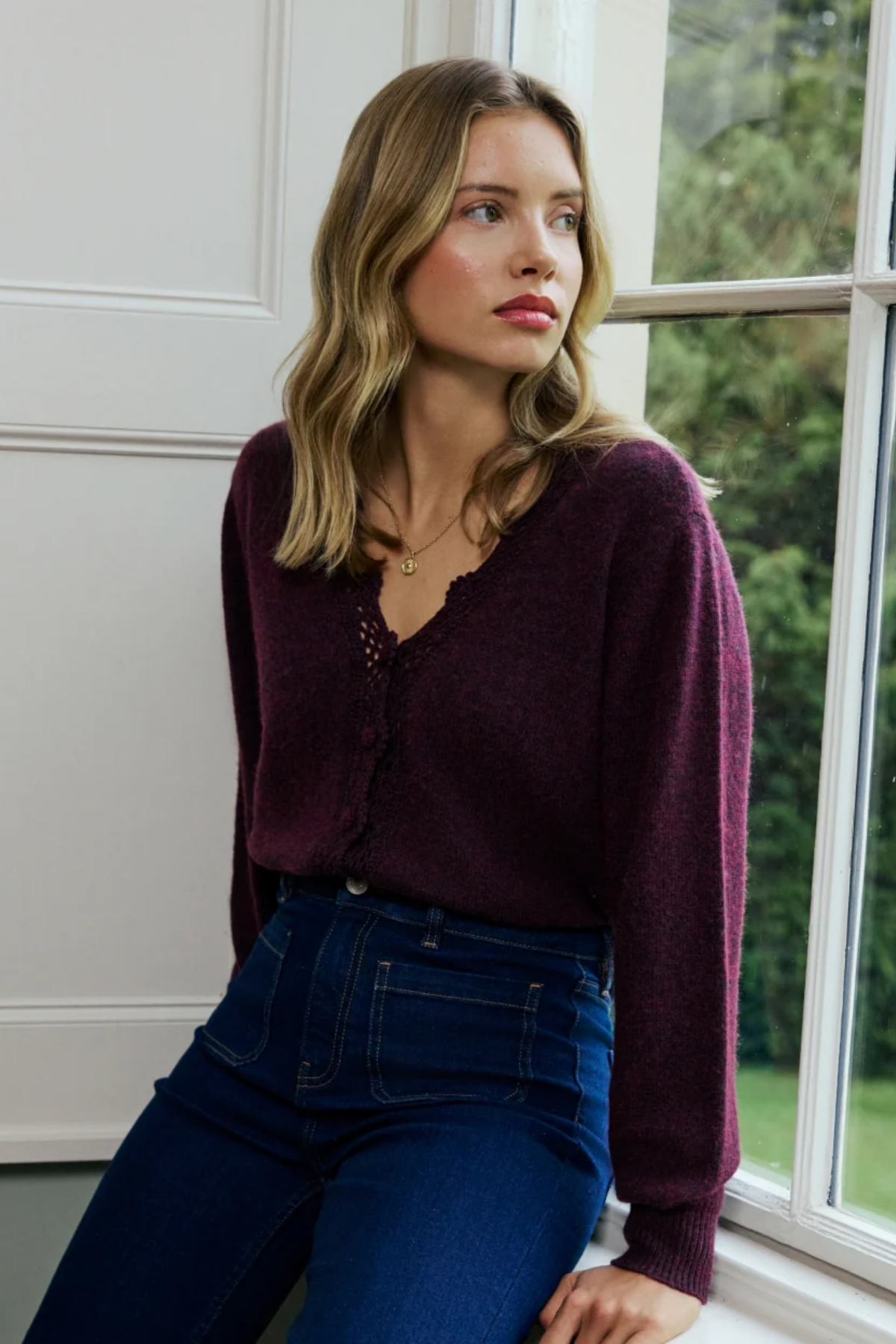 Shop the Nobody’s Child Elodie Crochet Trim Cardigan in Burgundy at Dotique. A soft wool-blend cardigan with floral crochet detailing and a relaxed fit.