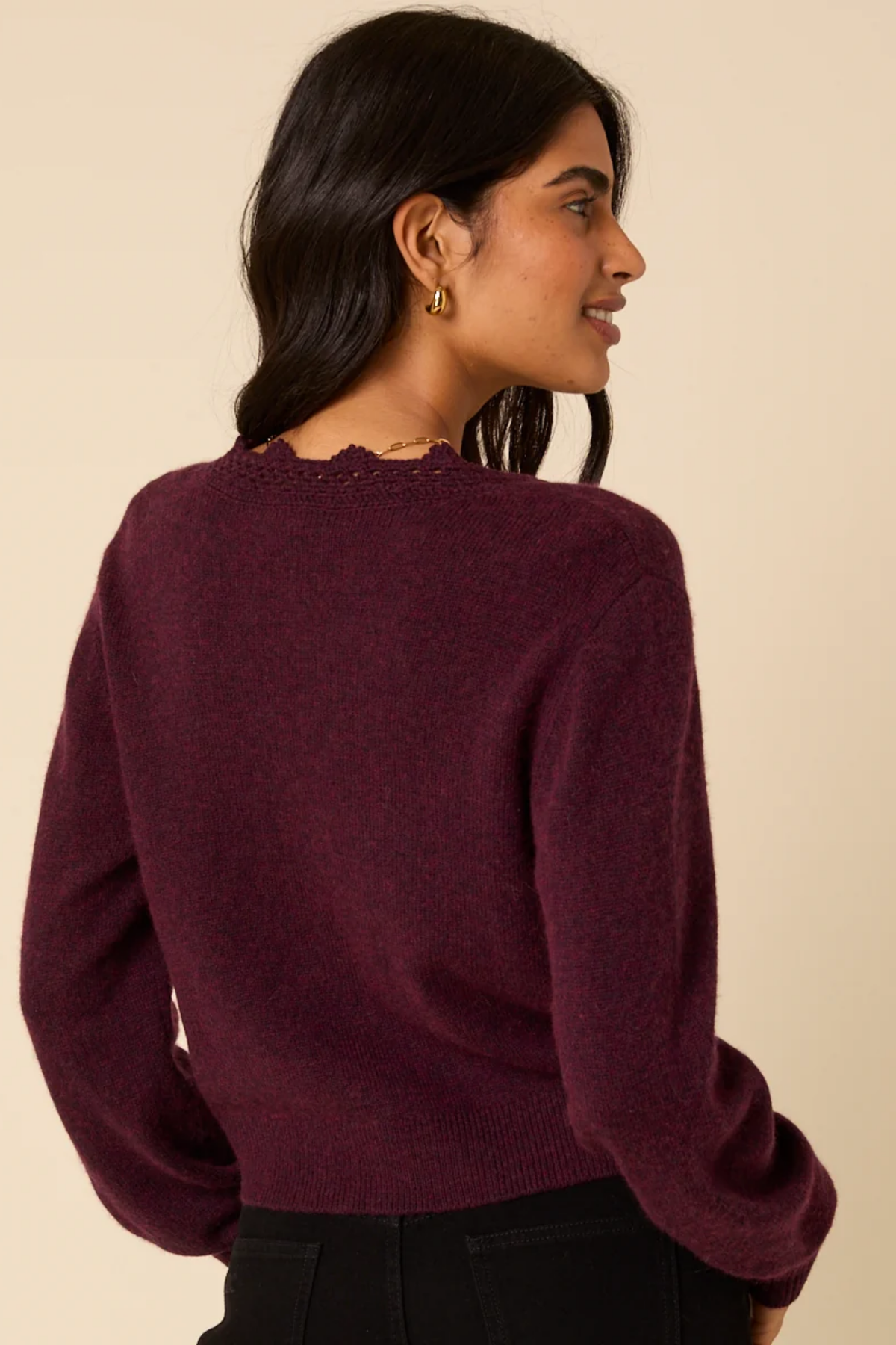 Shop the Nobody’s Child Elodie Crochet Trim Cardigan in Burgundy at Dotique. A soft wool-blend cardigan with floral crochet detailing and a relaxed fit.