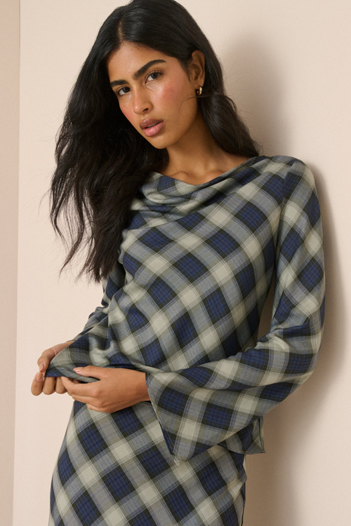 Model wearing Nobody's Child Cruz Navy Check Cowl Neck Top by Nobody's Child. Shop Nobody's Child at Dotique.