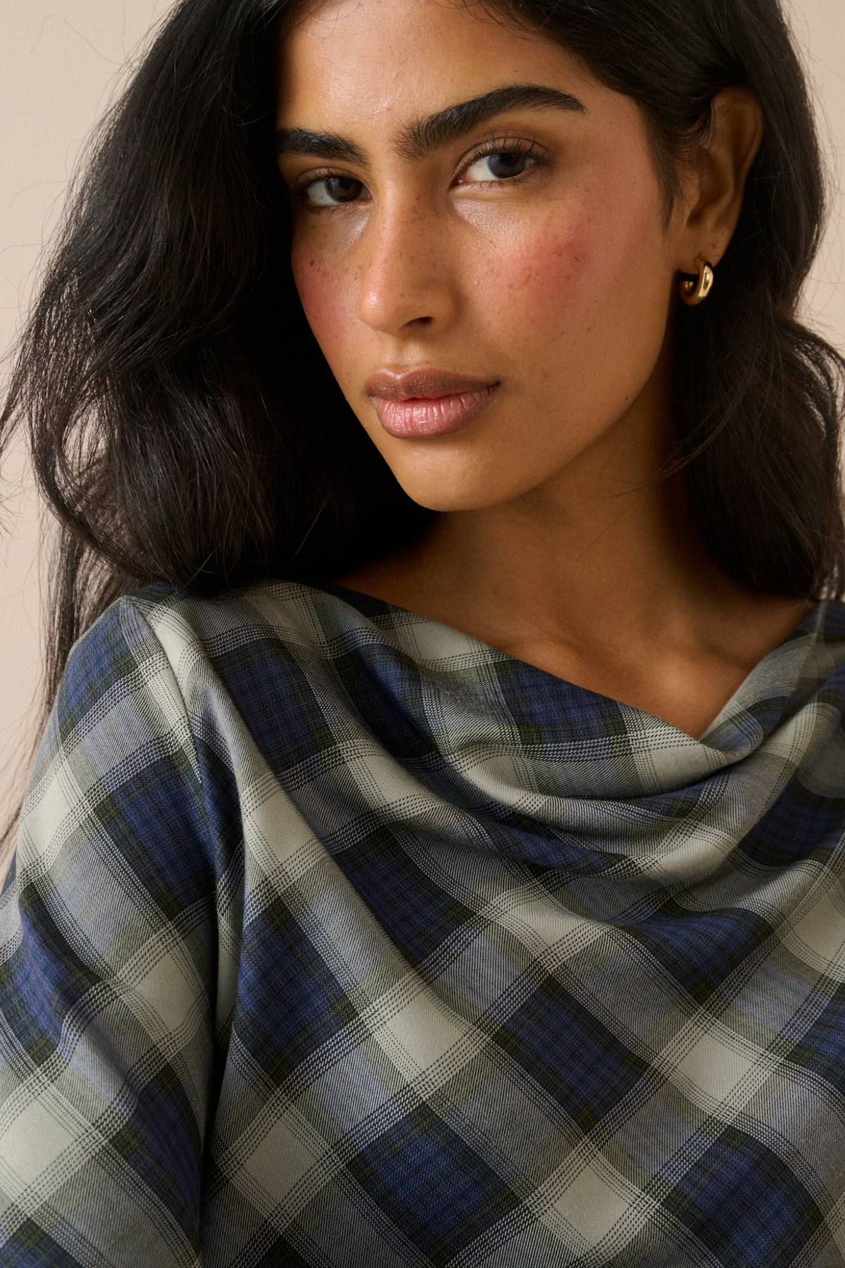 Model wearing Nobody's Child Cruz Navy Check Cowl Neck Top. Shop Nobody's Child at Dotique.
