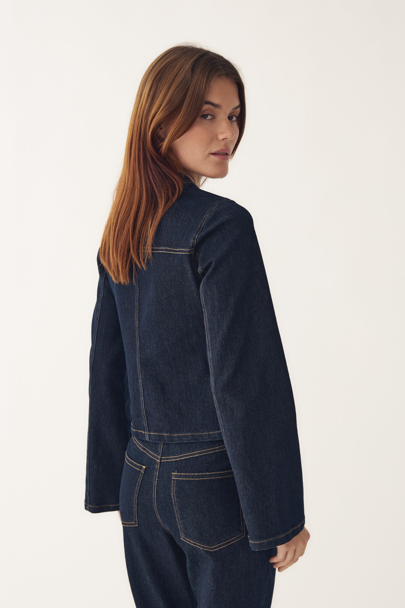 Model wearing Noella  15080001 N-Mazie Jacket Blue Unwashed by noella shop noella at Dotique back view