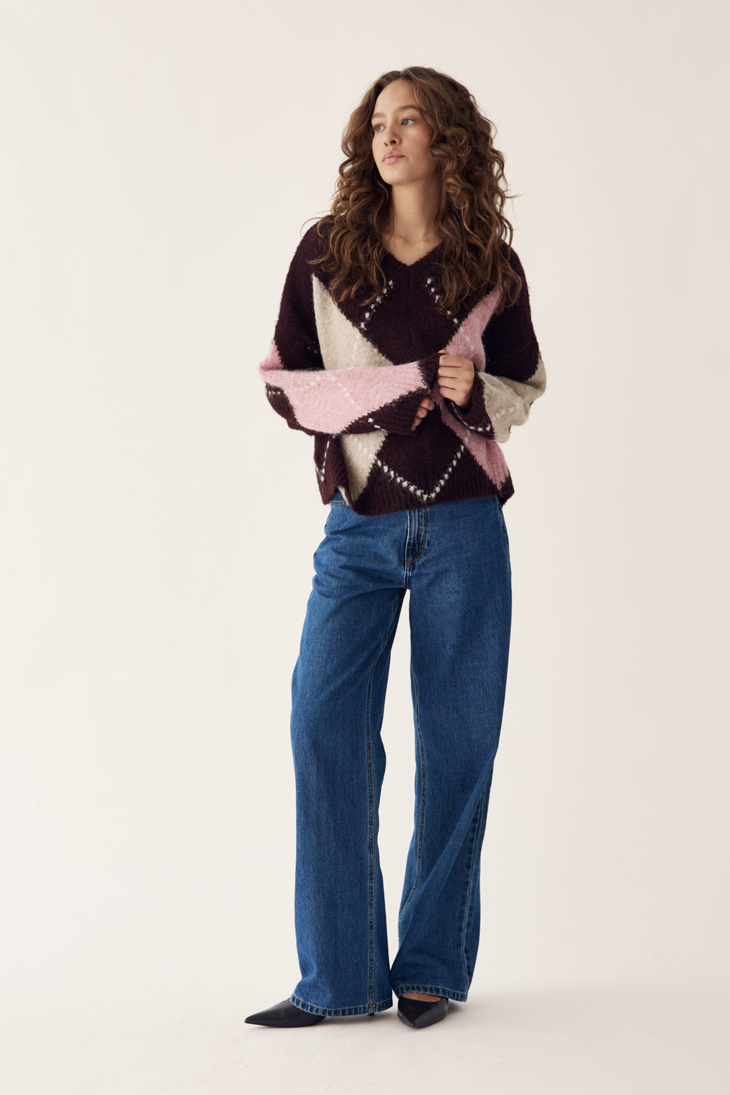 The Noella Lai Knit Jumper in Winetasting Mix brings a softer, more feminine take on the Highland Romance trend. Shop Noella at Dotique.
