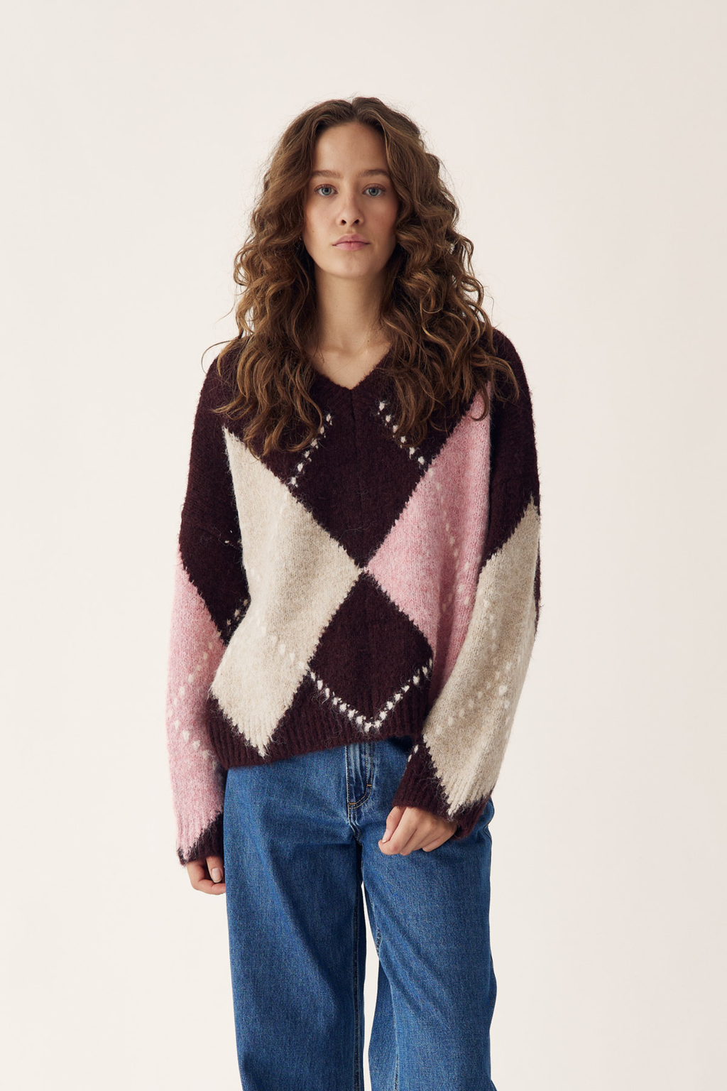 The Noella Lai Knit Jumper in Winetasting Mix brings a softer, more feminine take on the Highland Romance trend. Shop Noella at Dotique.