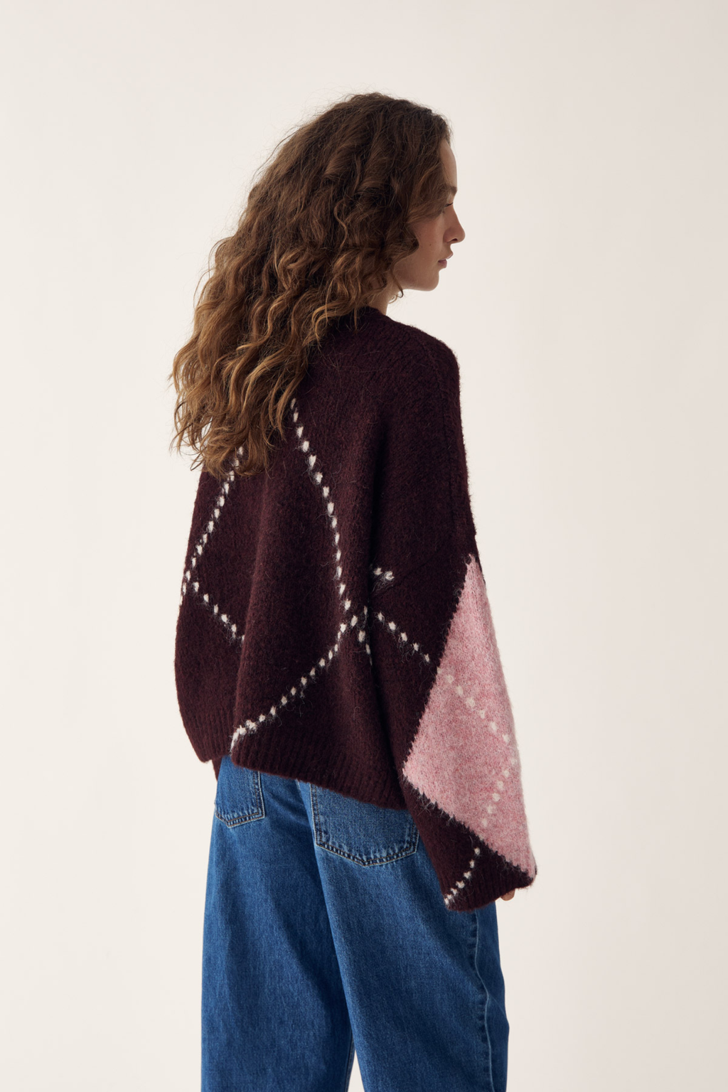 The Noella Lai Knit Jumper in Winetasting Mix brings a softer, more feminine take on the Highland Romance trend. Shop Noella at Dotique.