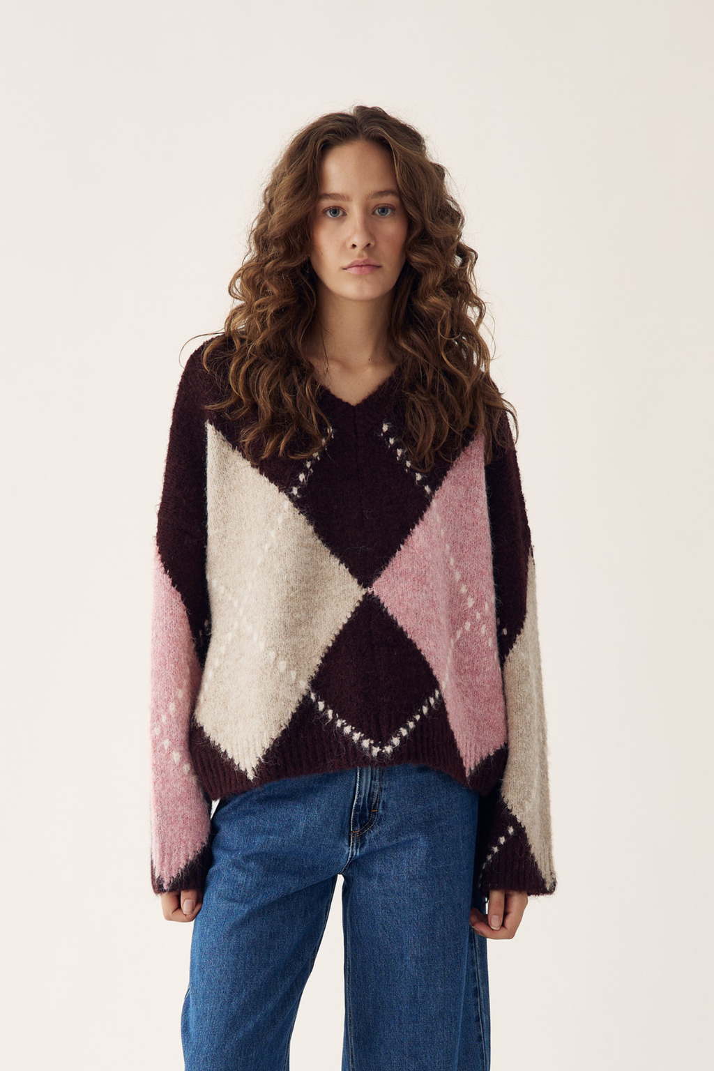 The Noella Lai Knit Jumper in Winetasting Mix brings a softer, more feminine take on the Highland Romance trend. Shop Noella at Dotique.