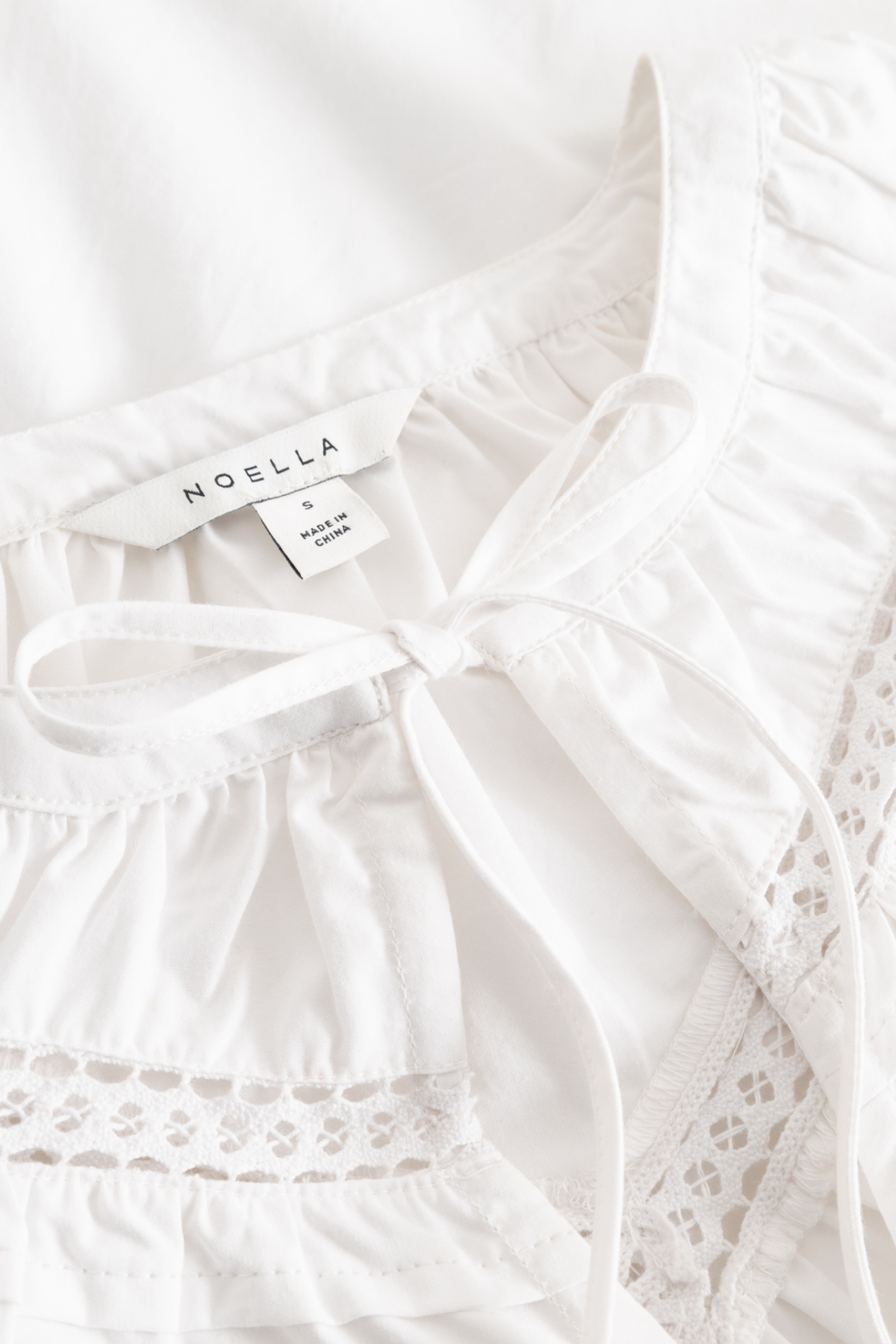 Noella 15050001 N-Marceline Blouse White cotton tie front blouse with balloon sleeves at Dotique