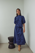 Noella dusty blue cotton skirt with elastic waistband and broderie anglaise hem